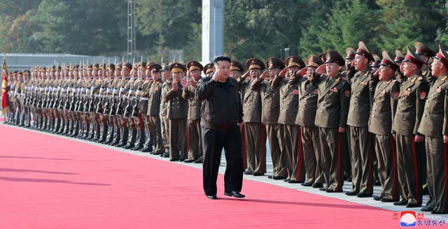 <p>Kim Jong-un inspects soldiers at an undisclosed location earlier this year  </p>