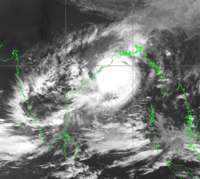 Satellite image from Himawari shows Cyclone Dana churning over Bay of Bengal as it heads to India’s eastern coast