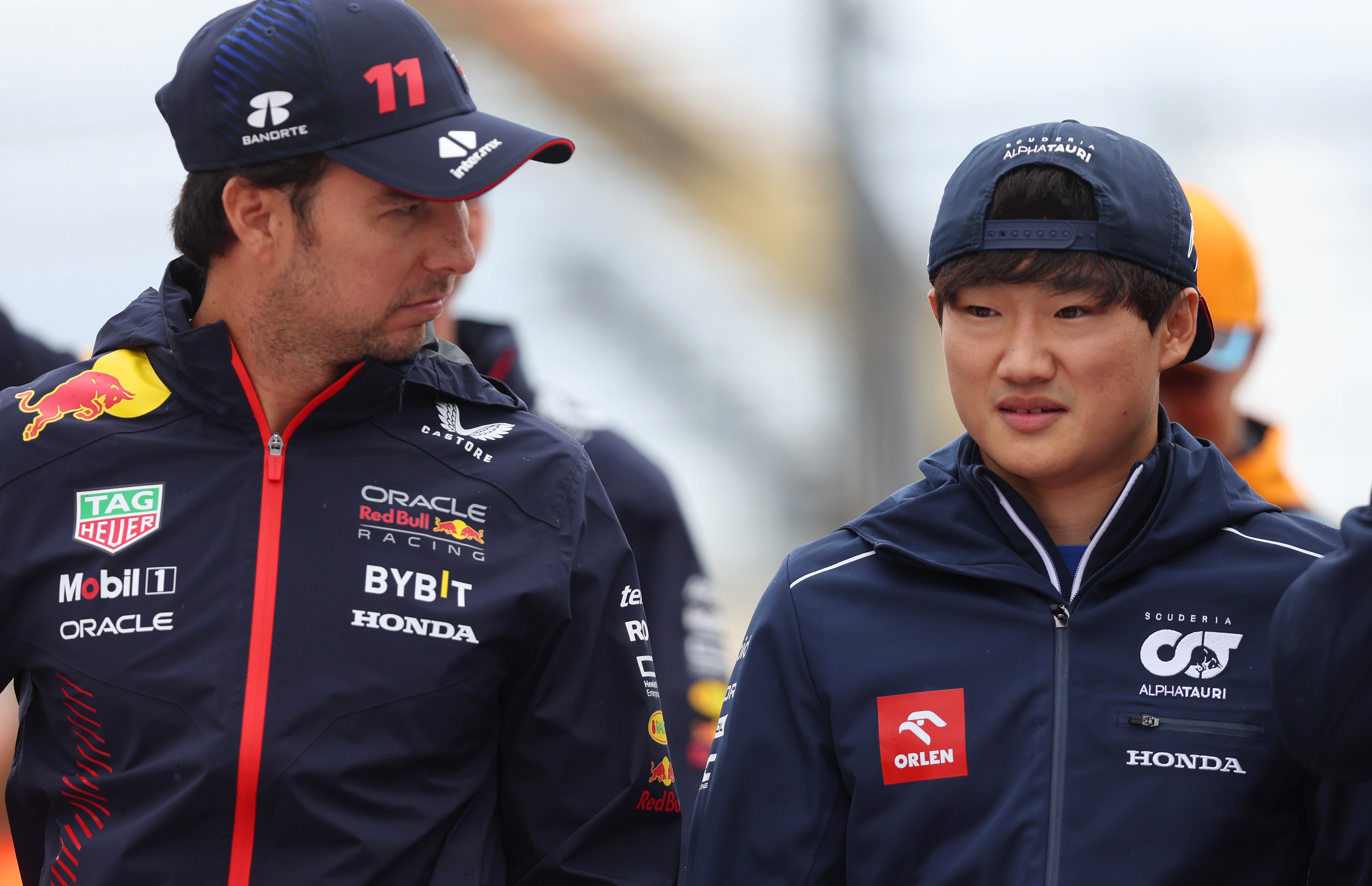 Johnny Herbert says Red Bull should drop Sergio Perez (left) for Yuki Tsunoda (right)