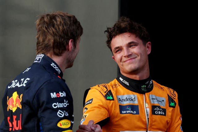 <p>McLaren’s Lando Norris (right) speaks to Red Bull’s Max Verstappen </p>