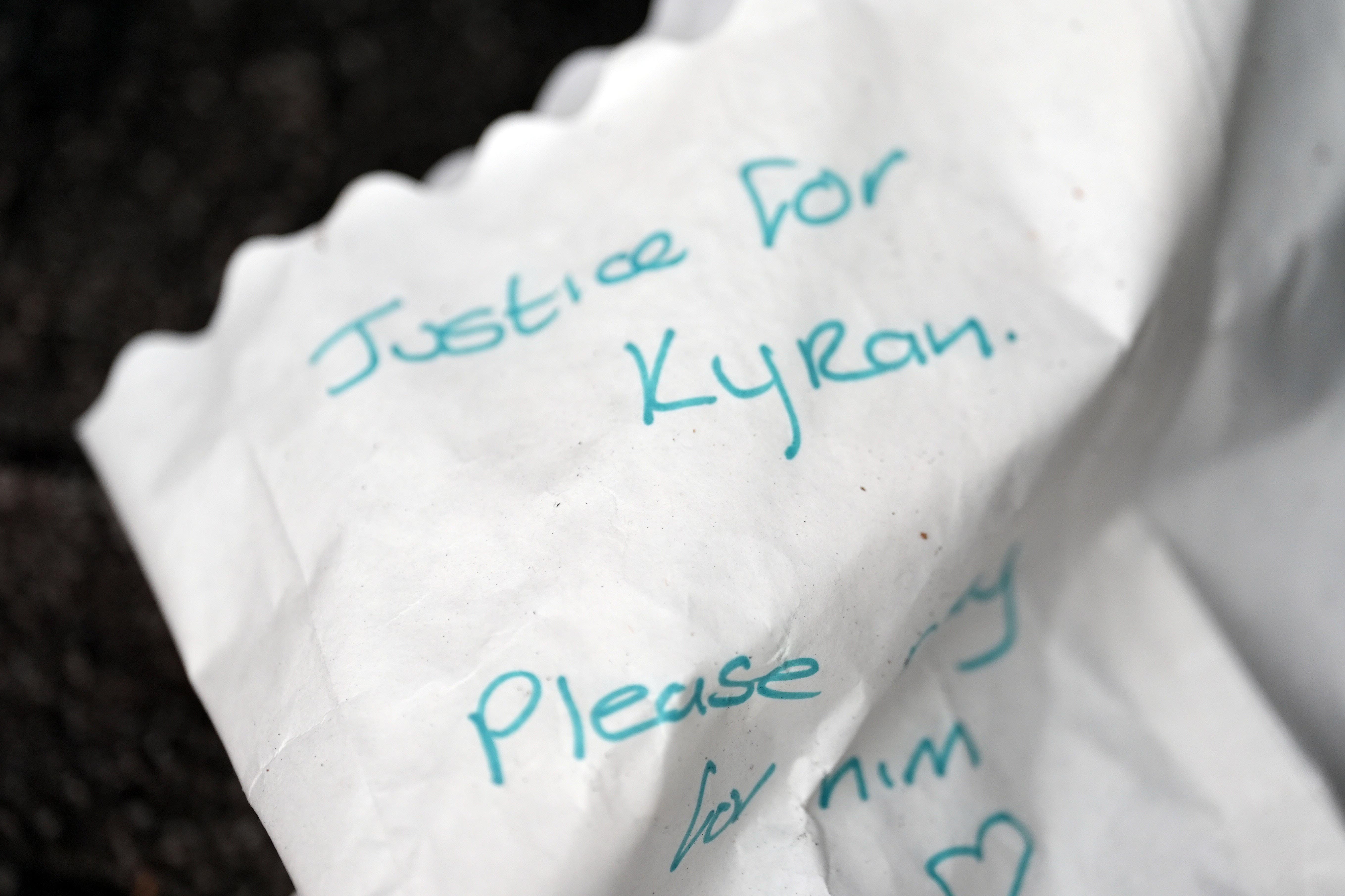 Messages and candles left in Dundalk, Co Louth, as the Garda investigation into the suspected murder of eight-year-old Kyran Durnin continues (Brian Lawless/PA)