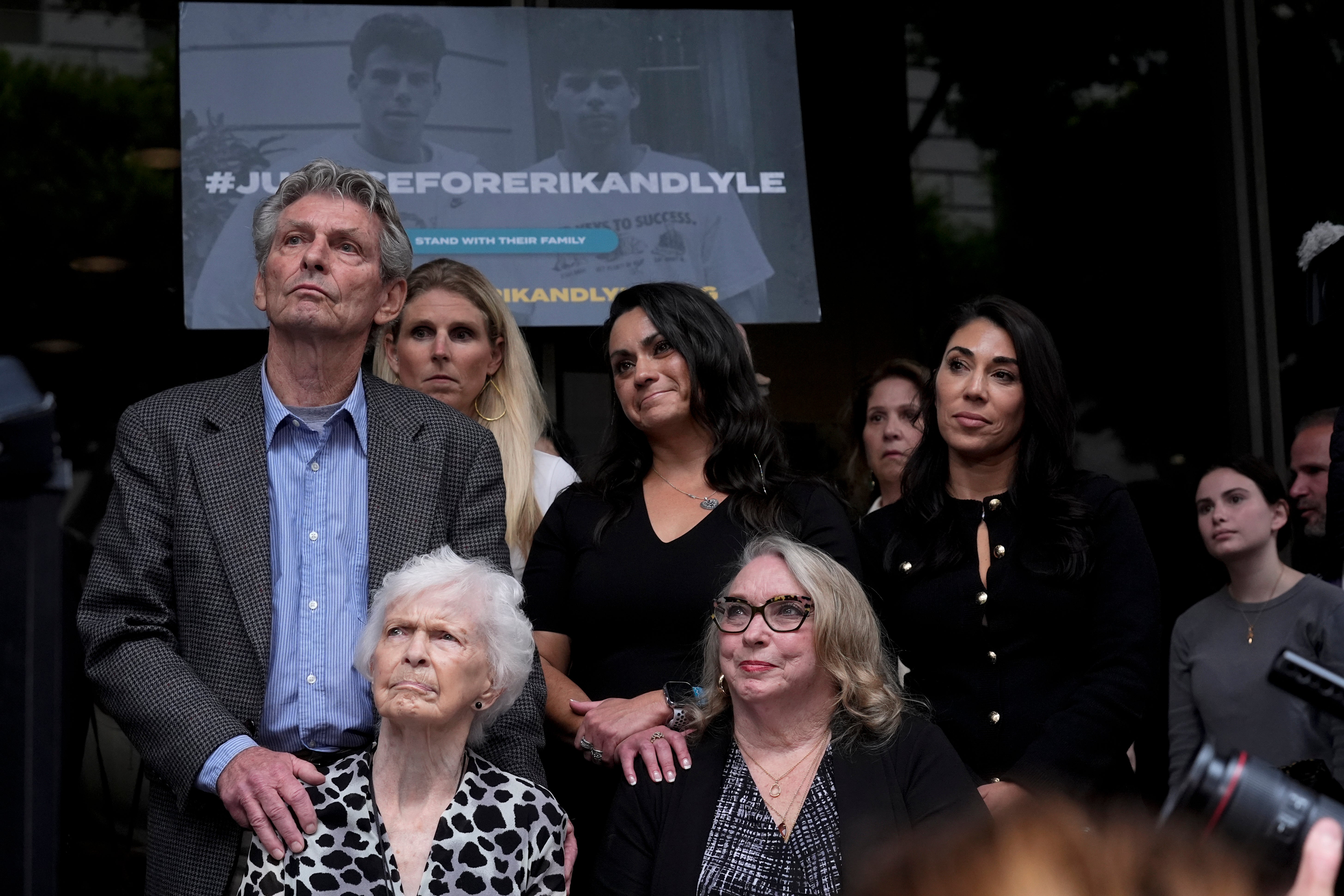 Kitty Menendez's sister, Joan Andersen VanderMolen, bottom left, and niece Karen VanderMolen, right, sit together during a press conference to announce developments on the case earlier this month