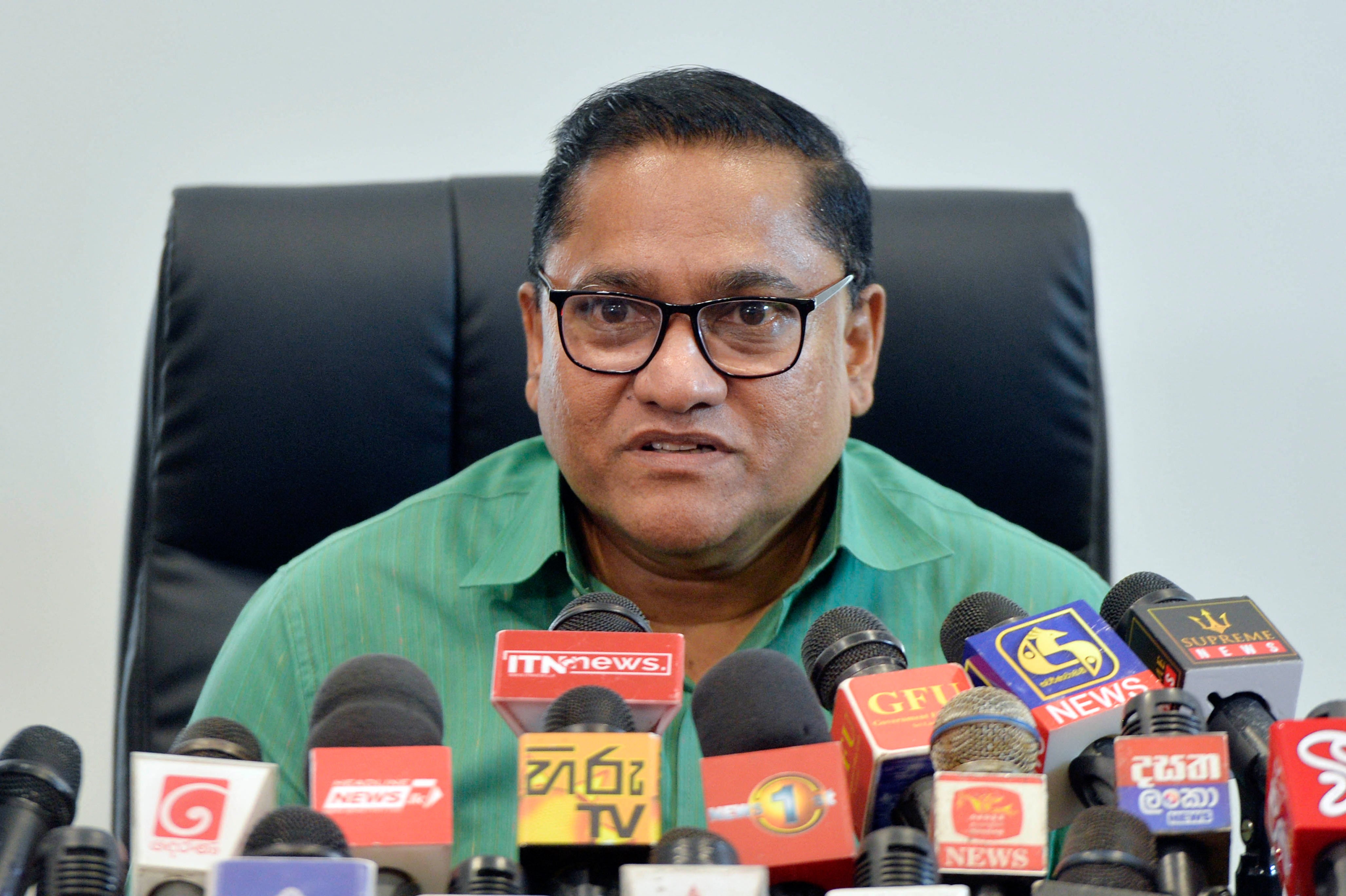 Sri Lanka's foreign minister Vijitha Herath addresses the media in Colombo