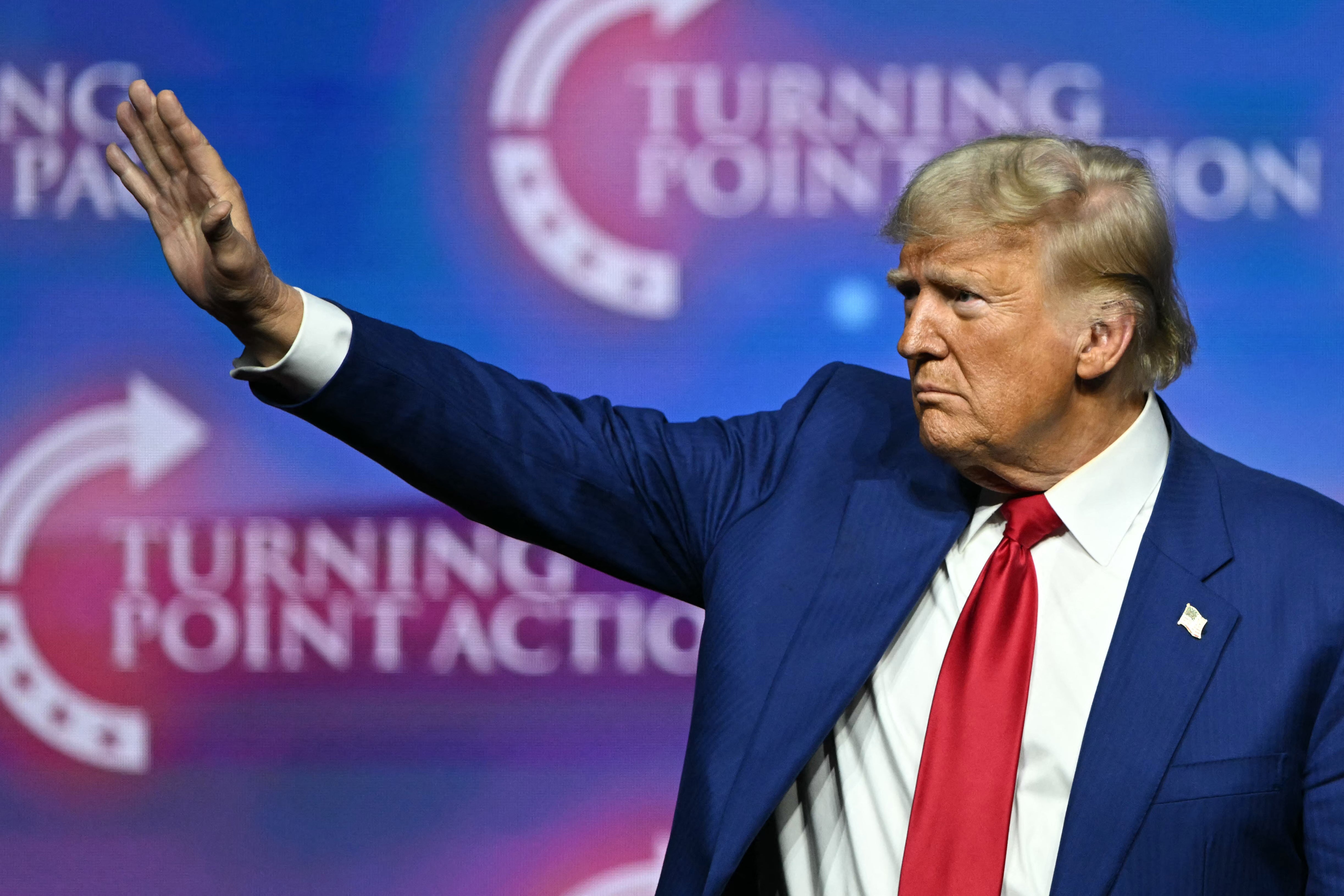 Trump waves as he departs after speaking during a Turning Point Action ‘United for Change’ campaign rally in Las Vegas, Nevada on October 24