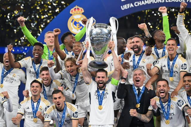 <p>Real Madrid celebrate winning the Champions League at Wembley Stadium in 2024</p>