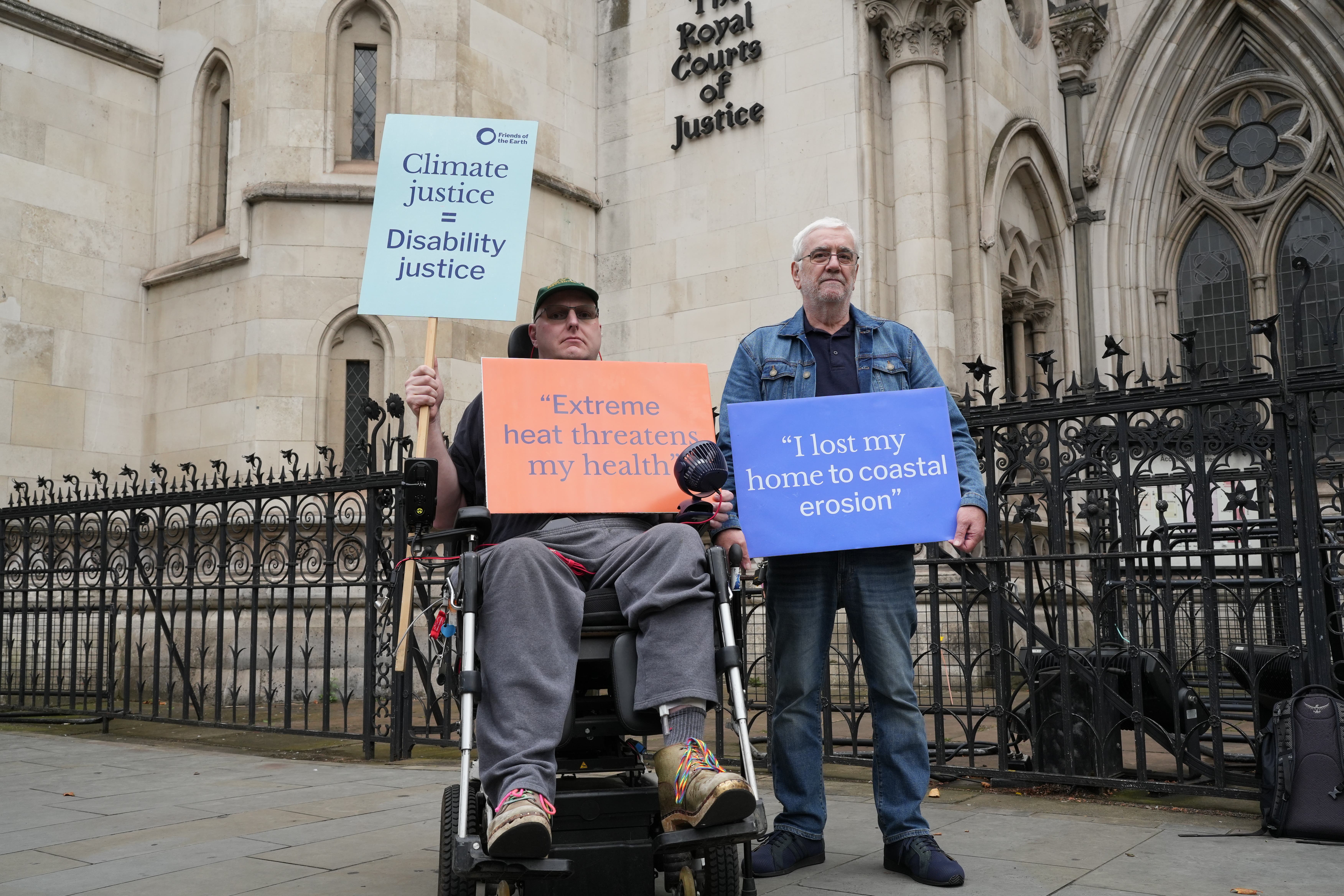 Doug Paulley (left) and Kevin Jordan outside the Royal Courts Of Justice, central London, earlier this year (Friends of the Earth/PA)