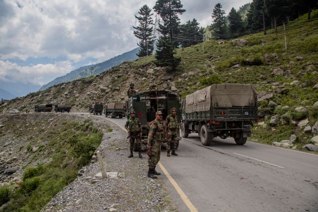 <p>File: Indian army convoy carrying reinforcements and supplies, drive towards Leh, on a highway bordering China</p>