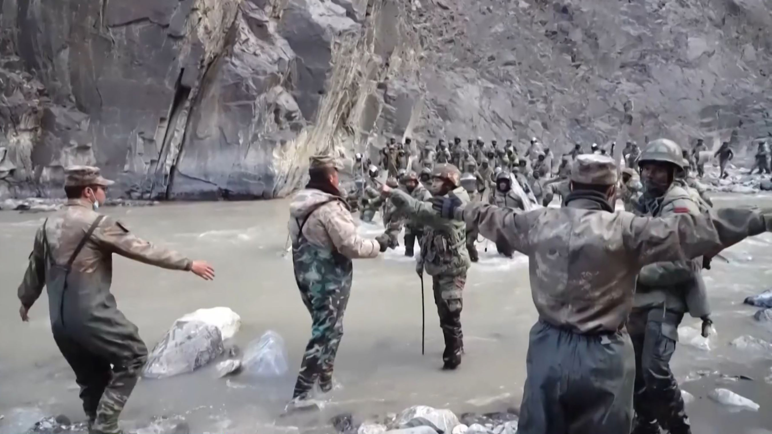 Footage from mid-June 2020 shows Chinese (foreground) and Indian soldiers (R, background) during an incidental  wherever  troops from some  countries clashed successful  the Line of Actual Control (LAC) successful  the Galwan Valley, successful  the Karakoram Mountains successful  the Himalayas