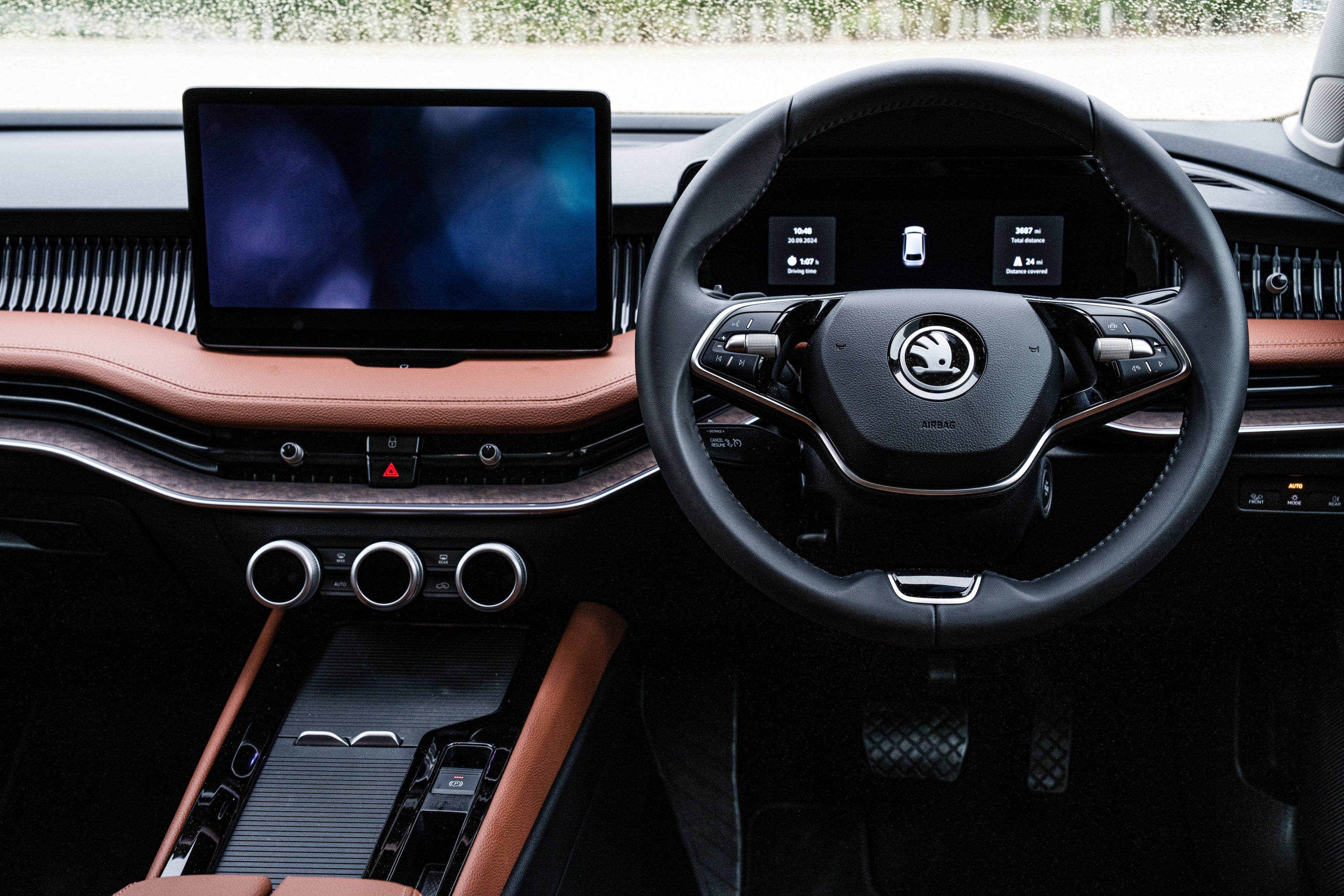 The cruise controls are relegated to a pod to the rear of the steering wheel