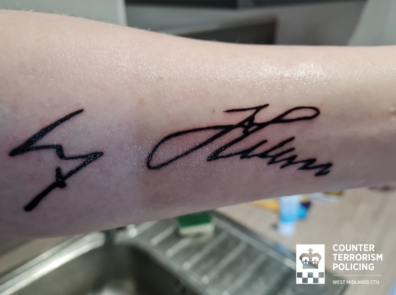 The tattoo of Adolf Hitler's signature on Callum Ulysses Parslow’s left forearm