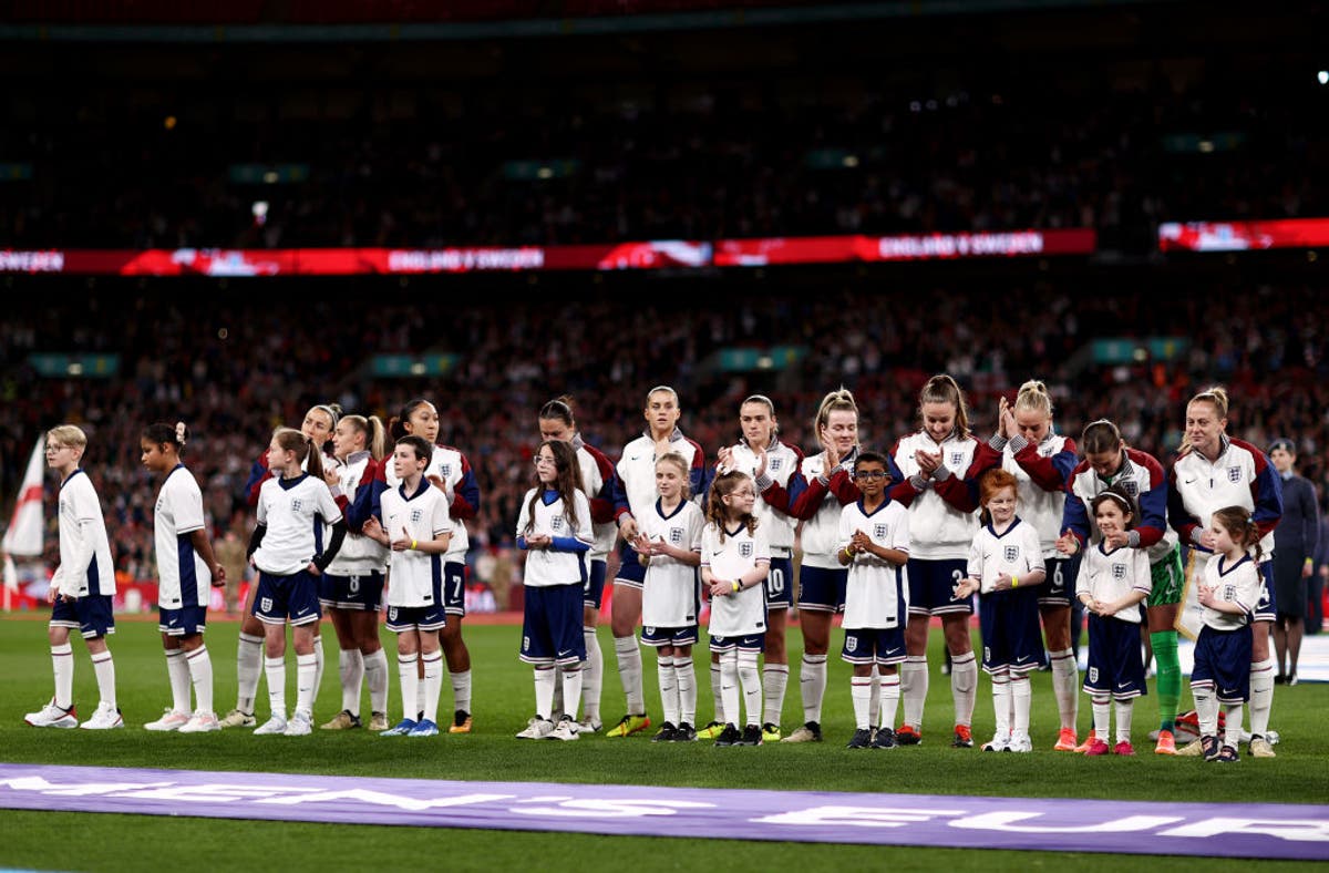 Why are England wearing black armbands tonight against Germany?