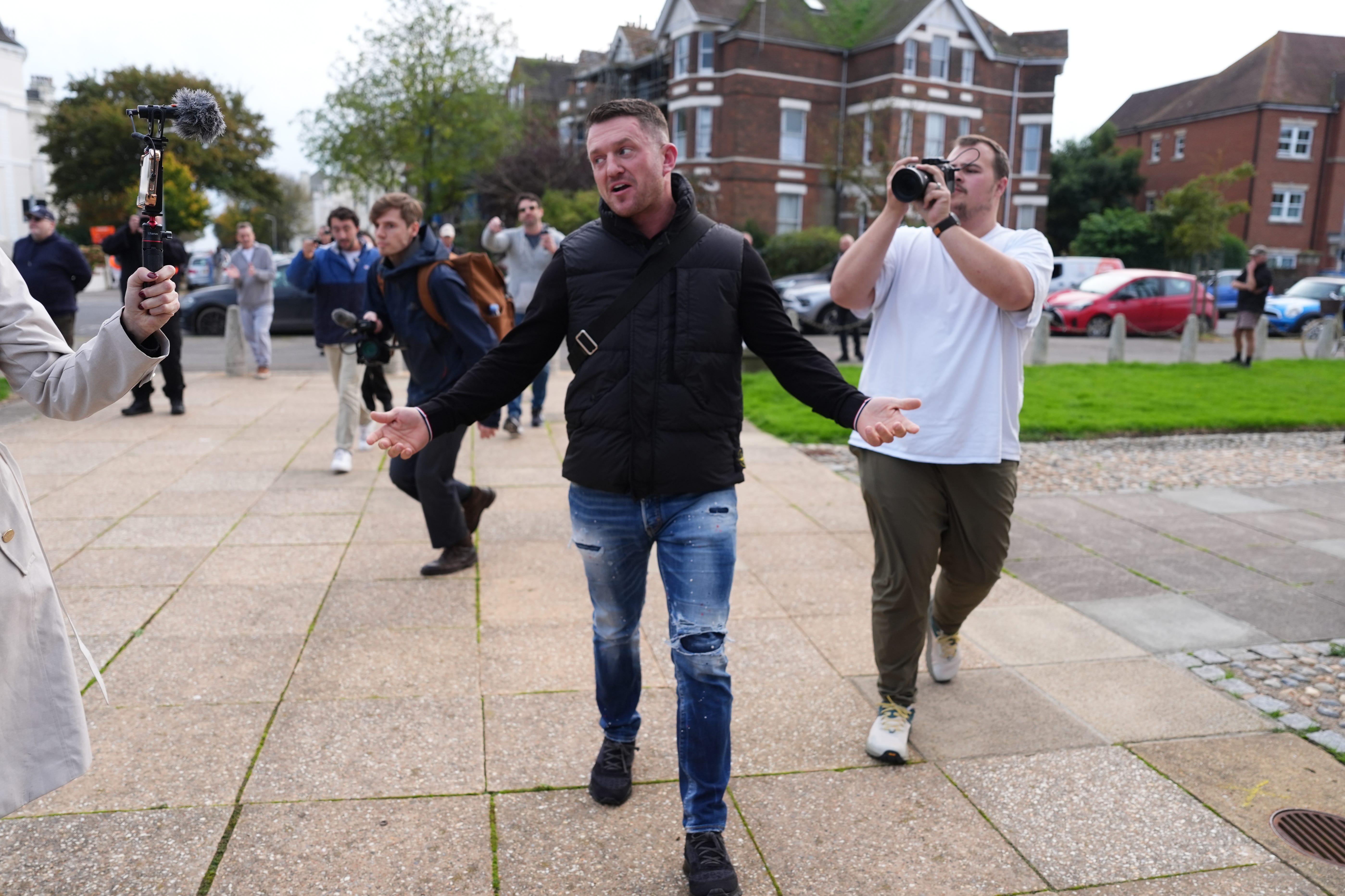 Tommy Robinson outside Folkestone Police Station (Jordan Pettitt/PA)