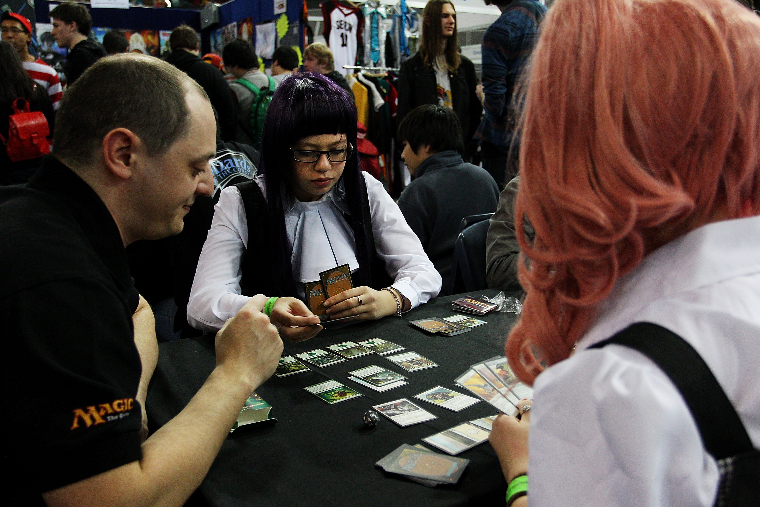 Magic the Gathering fans play the game during a festival in Sydney, Australia