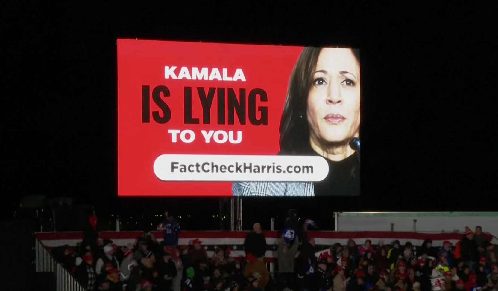 A billboard being shown at Donald Trump’s rally in Traverse City, Michigan