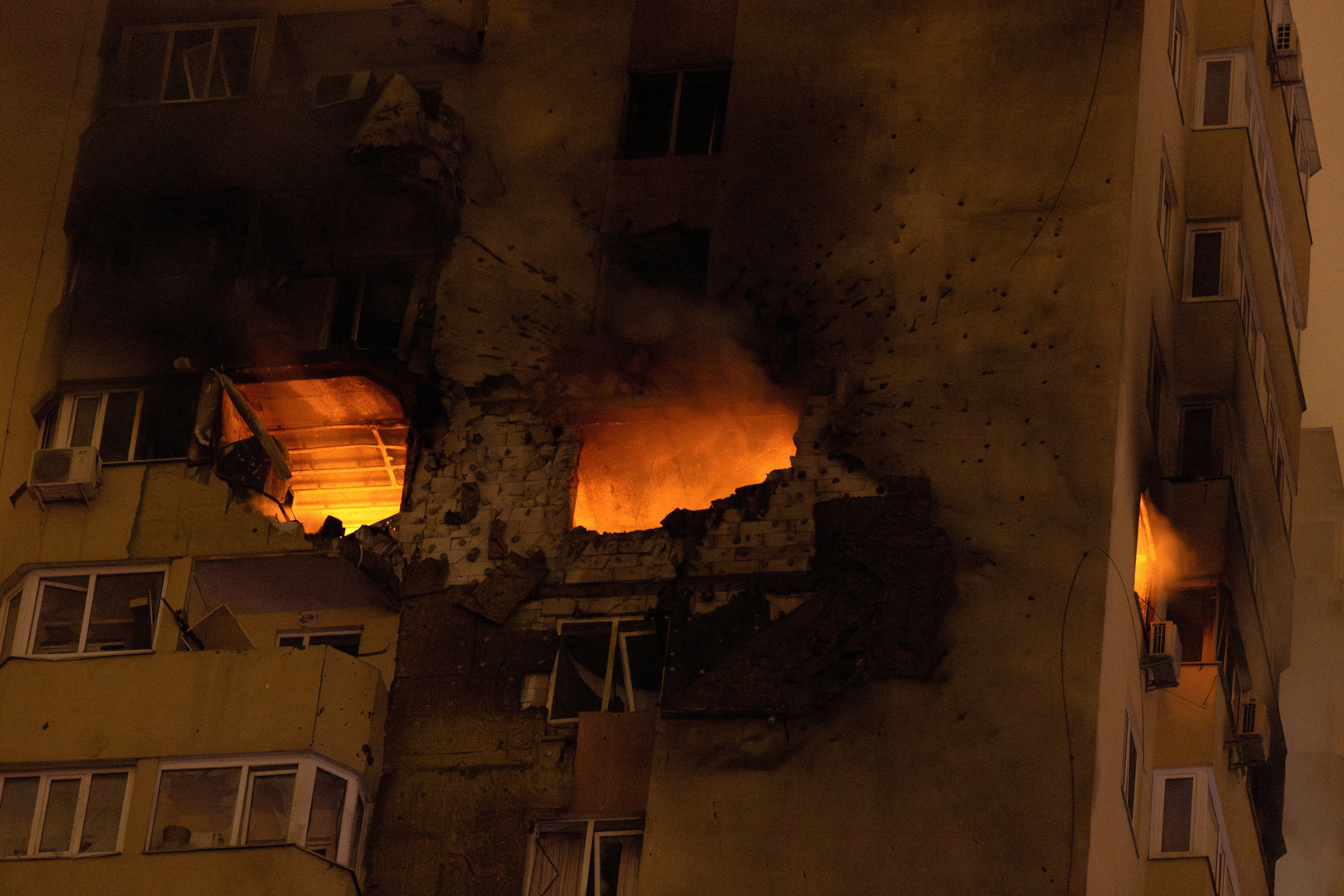 A fire burns in an apartment building that was hit during a Russian drone strike, amid Russia’s attack on Ukraine, in Kyiv, Ukraine, 25 October 2024