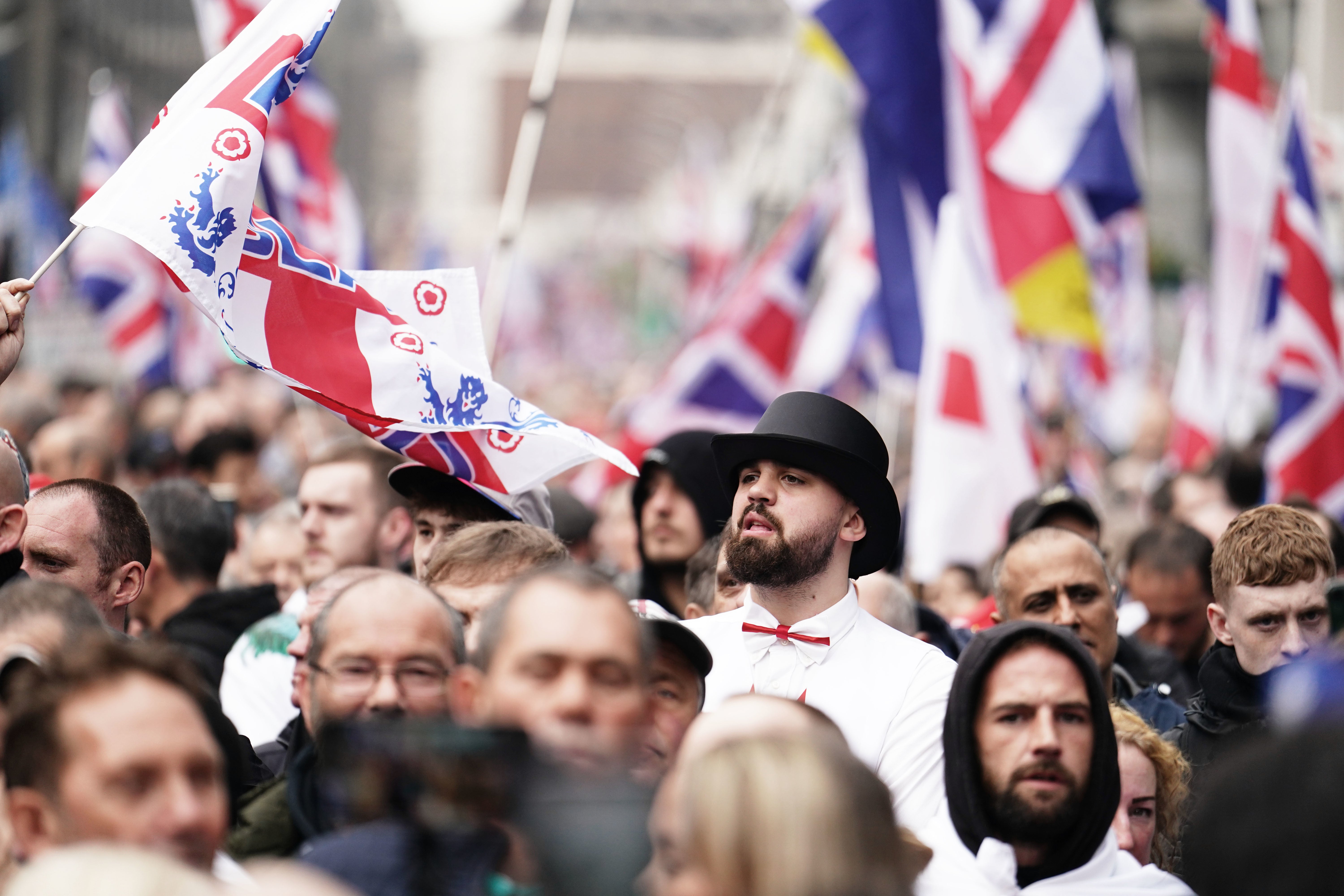 Supporters of a rally endorsed by Tommy Robinson march from Victoria Station to Parliament Square in central London (Jordan Pettitt/PA)