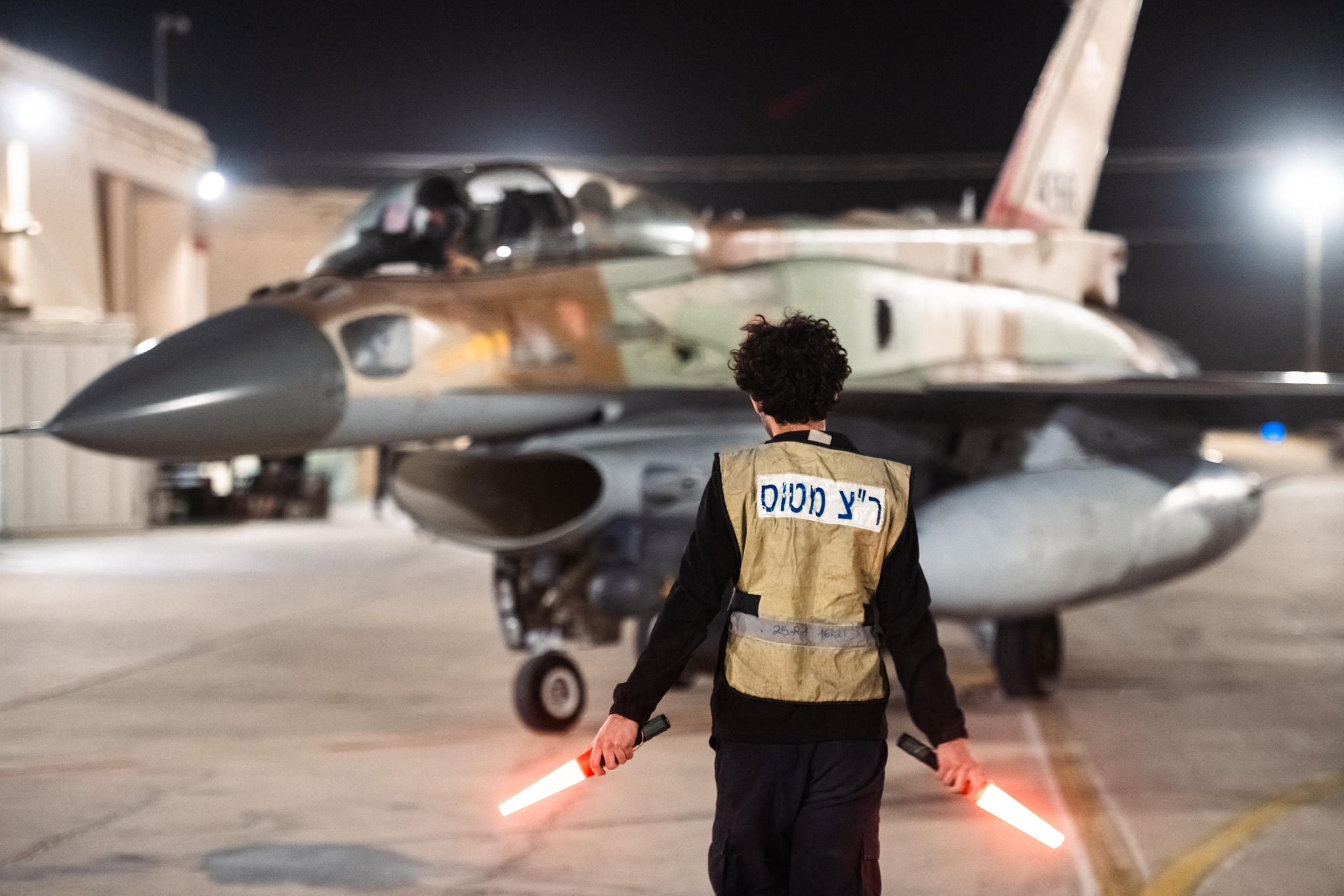 This handout picture released by the Israeli army on October 26, 2024, shows an Israeli fighter jet departing a hangar at an undisclosed location in Israel ahead of strikes on Iran.