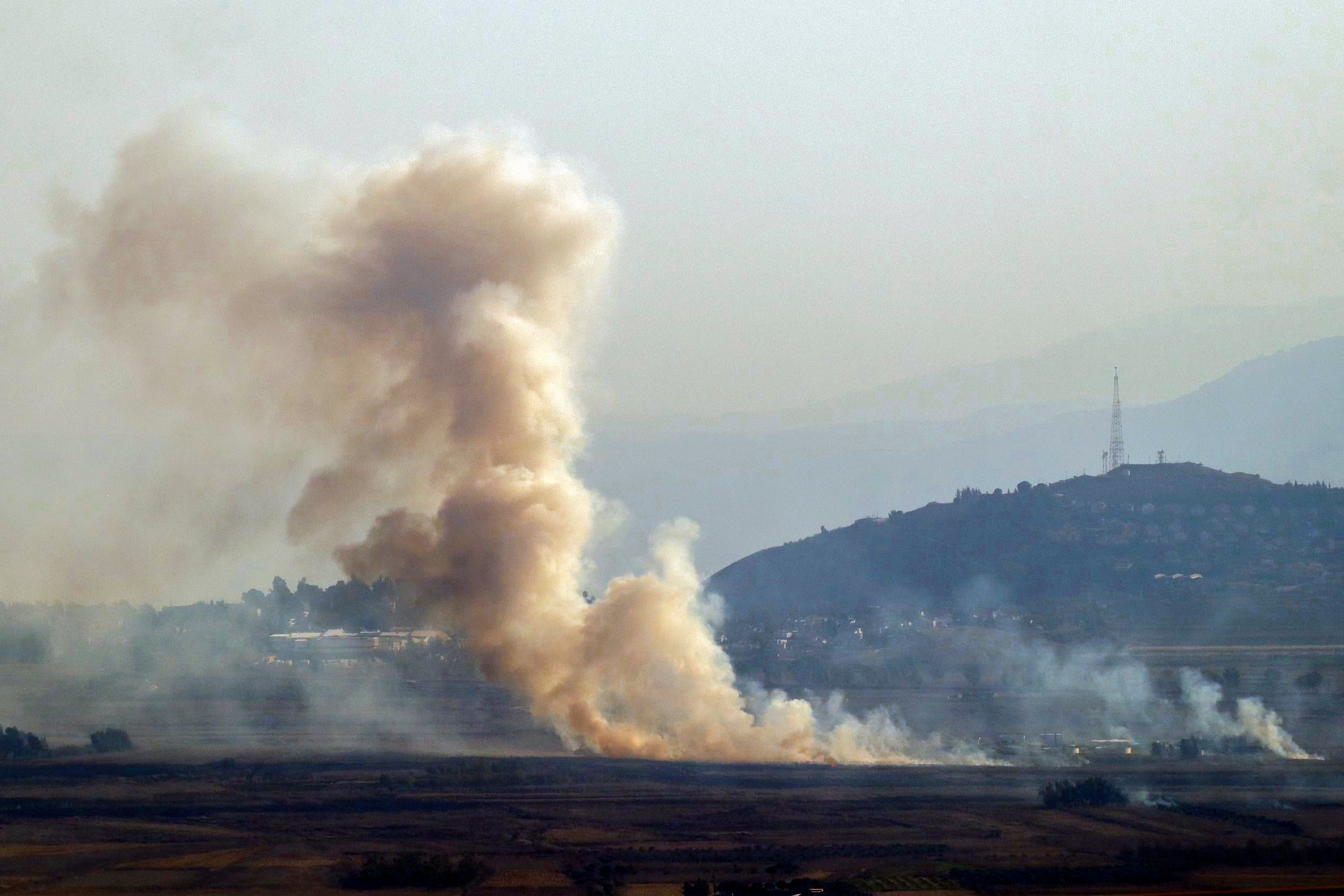 This picture taken from Lebanon's Marjayoun shows smoke rising following Israeli bombardment on October 26, 2024, amid the ongoing war between Israel and Hezbollah