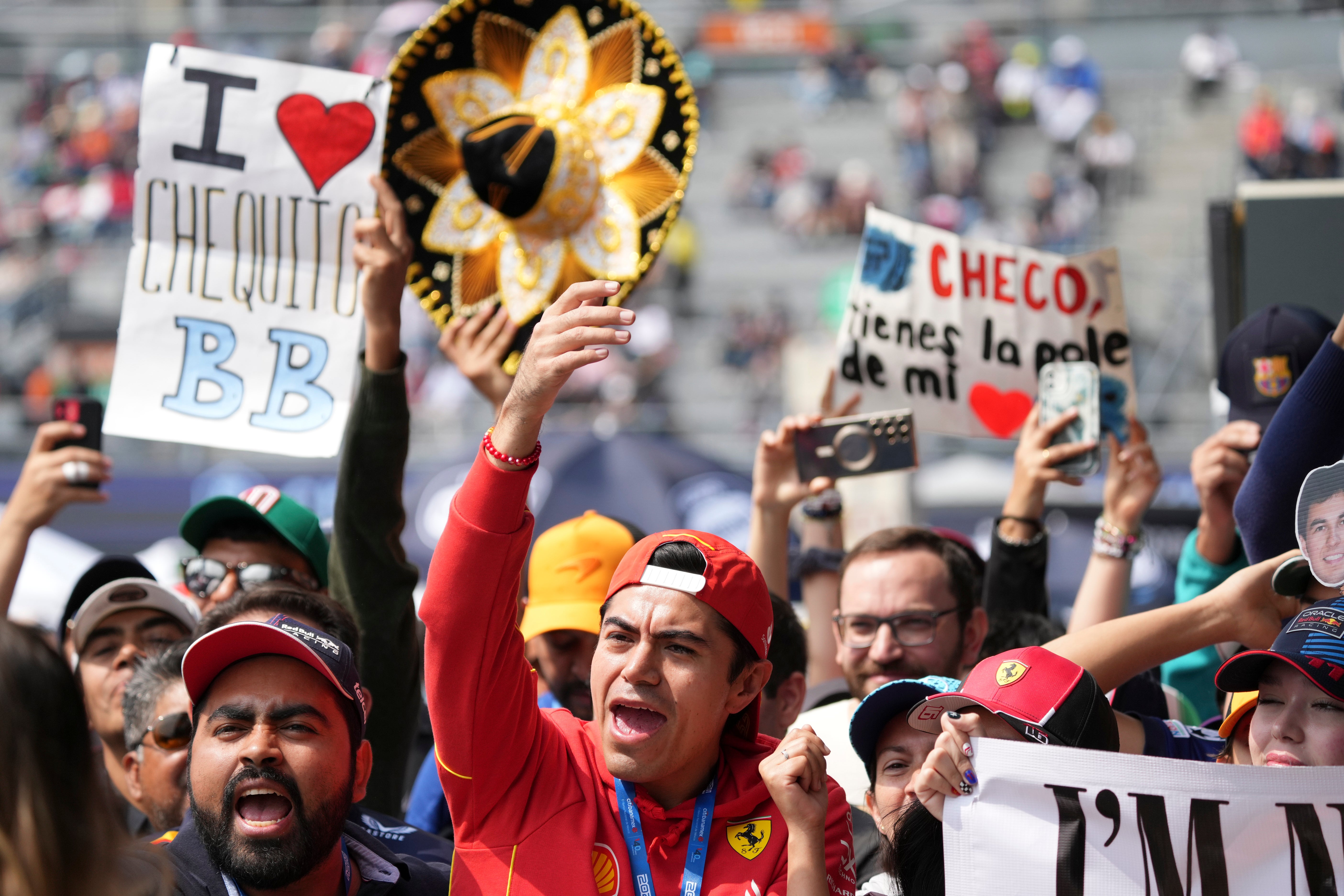 Fans cheer during the third free practice one day ahead of the Formula One Mexico Grand Prix