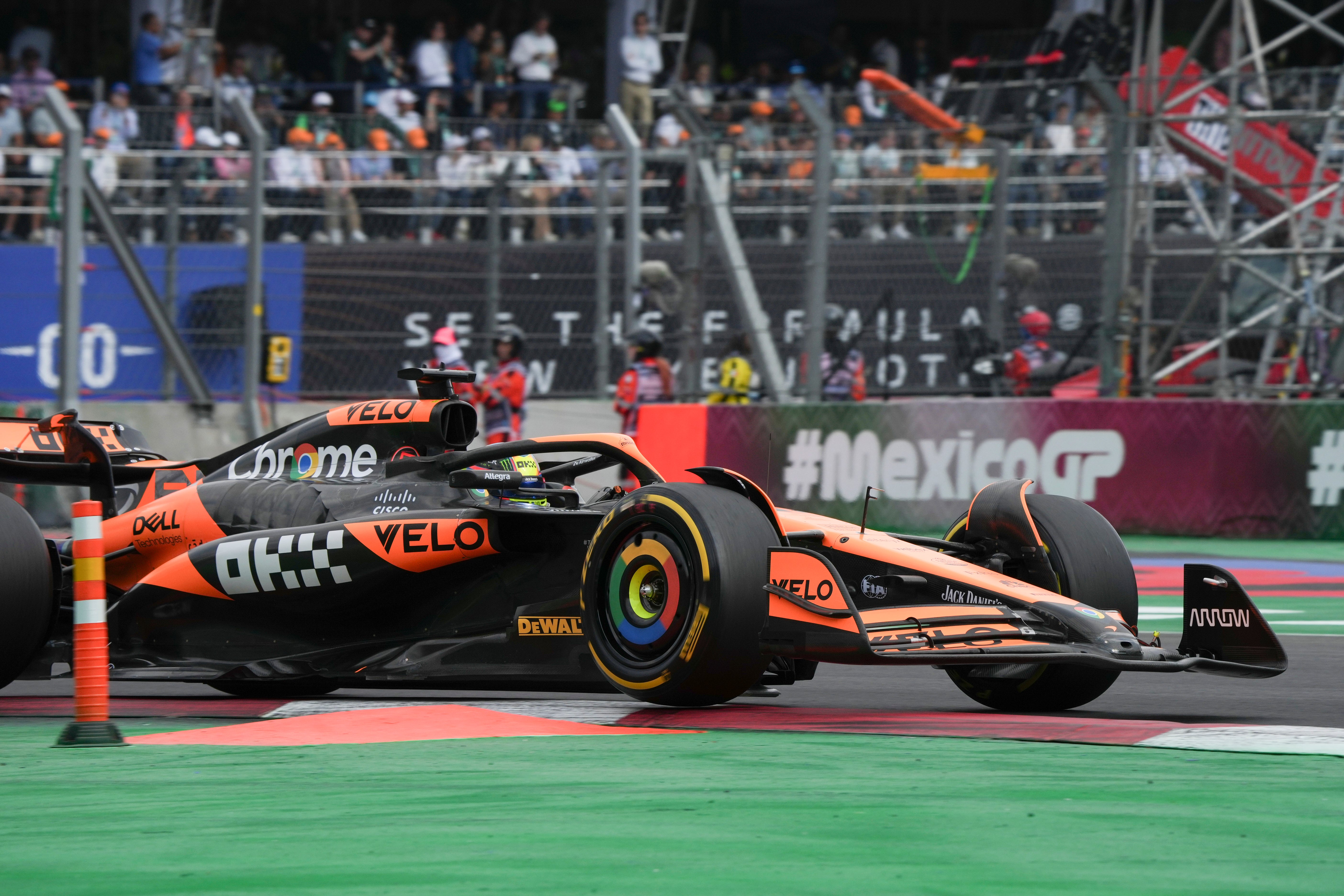 McLaren driver Lando Norris, of Britain, competes for pole position