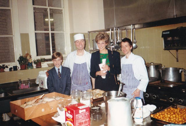 <p>William and Diana, Princess of Wales during a visit to the kitchen of The Passage just before Christmas 1993 (The Passage/PA)</p>