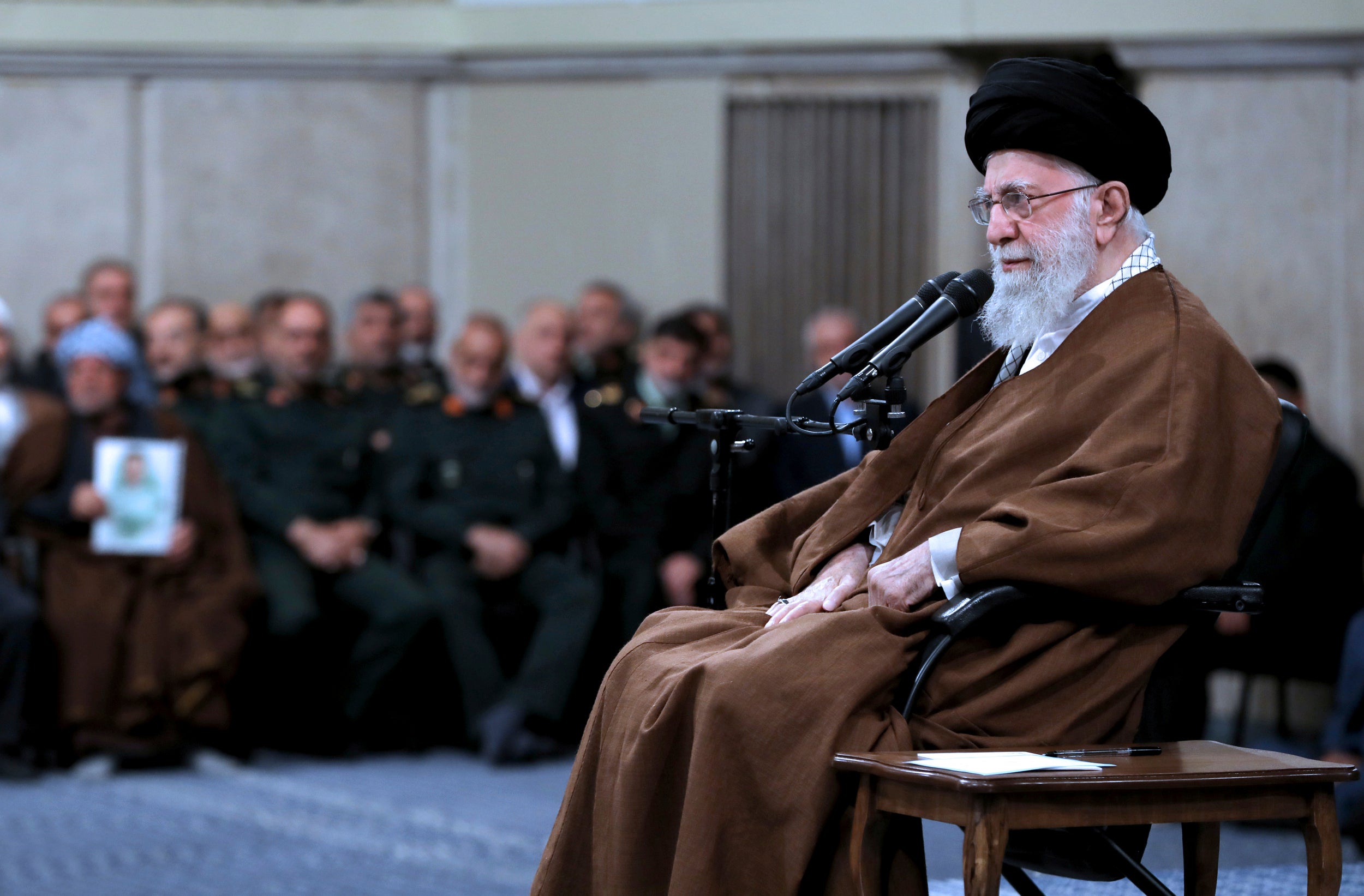 Ayatollah Ali Khamenei sits in a meeting in Tehran, Iran, on Sunday