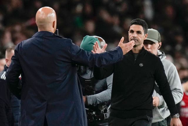 Mikel Arteta and Arne Slot shake hands (Alastair Grant/AP)