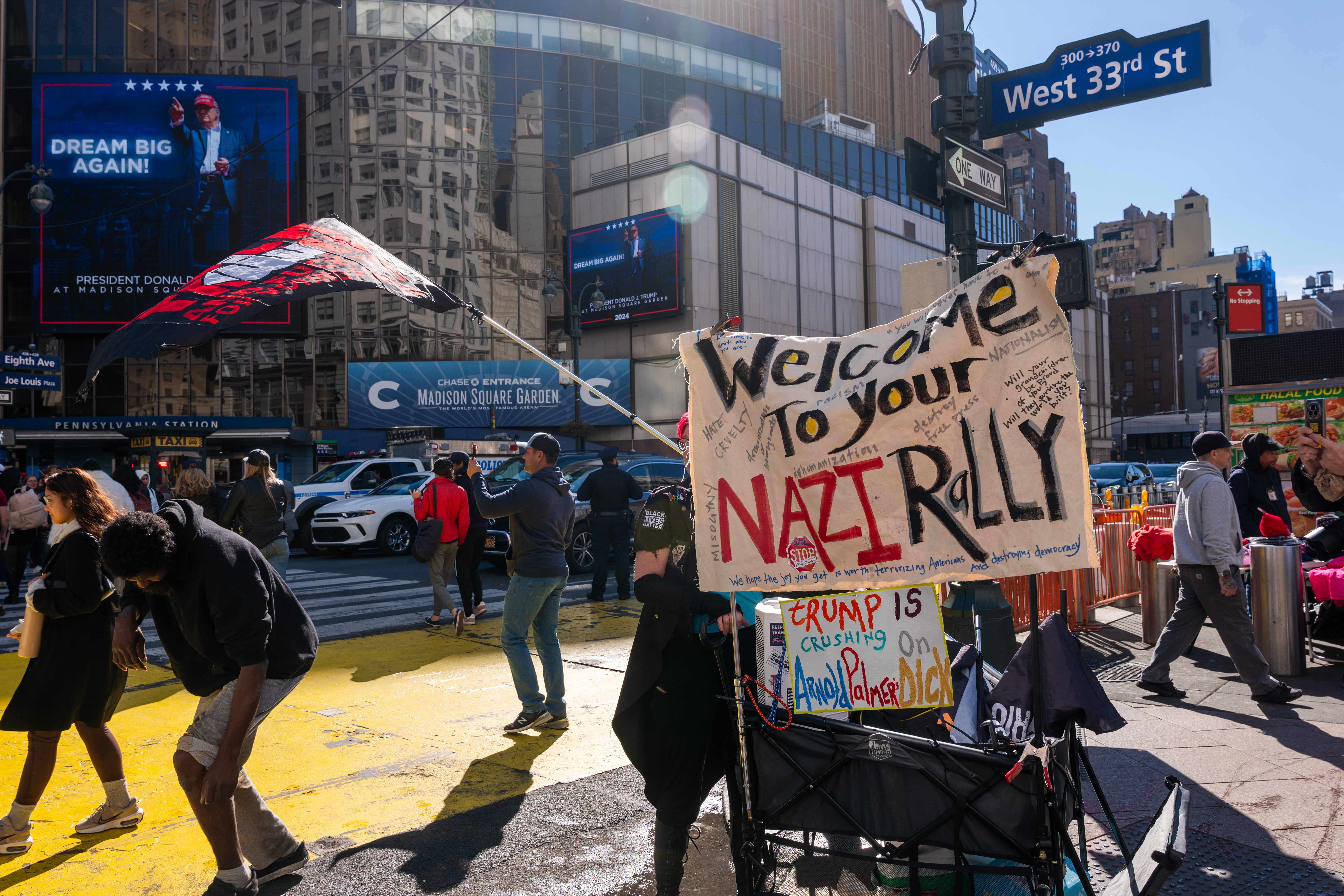 Anti-Trump protestors hold a “Welcome to your Nazi rally” banner outside of MSG – a reference to the infamous 1939 Nazi rally held at the arena