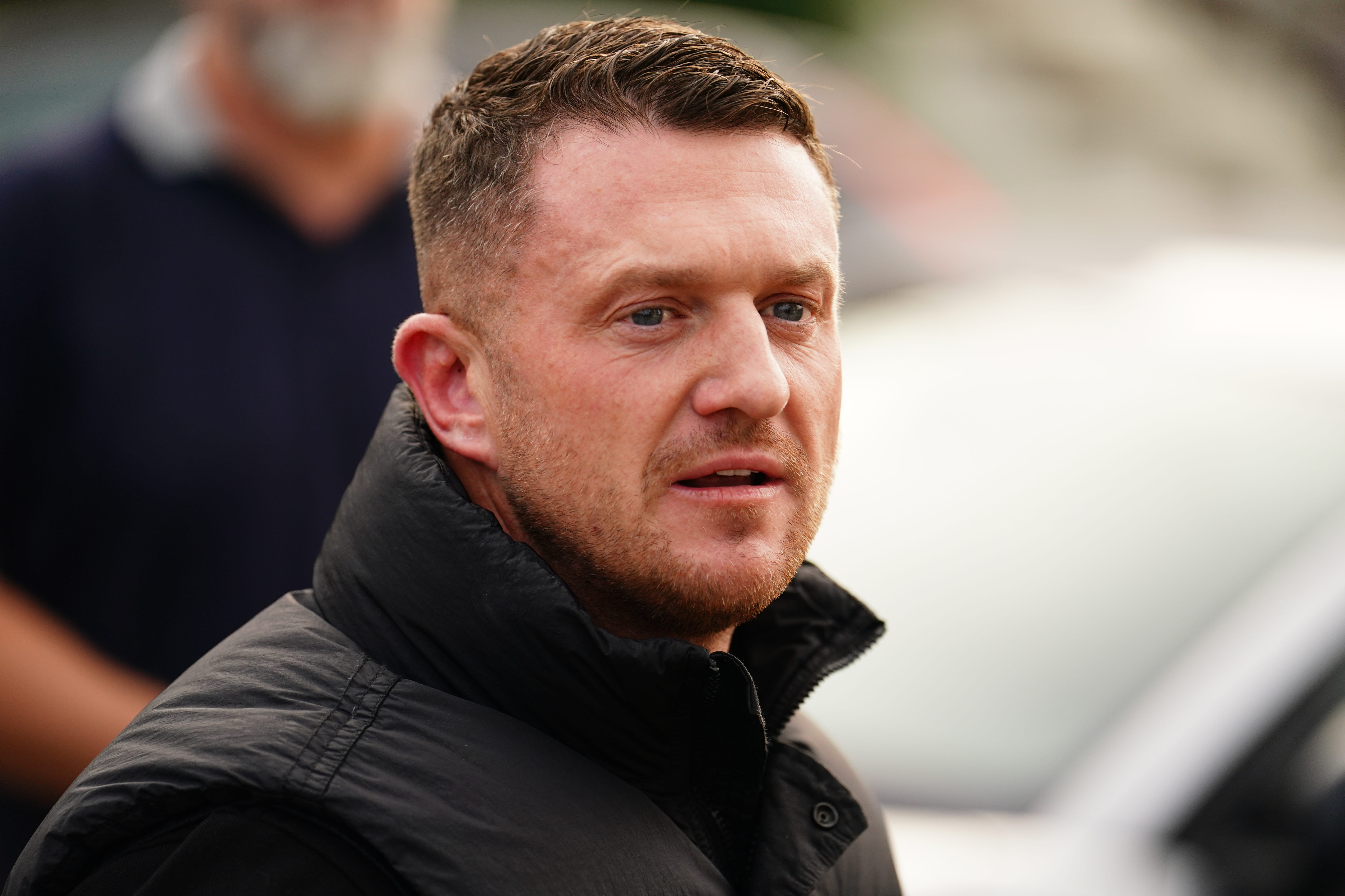 Political activist Tommy Robinson outside Folkestone police station (Jordan Pettitt/PA)