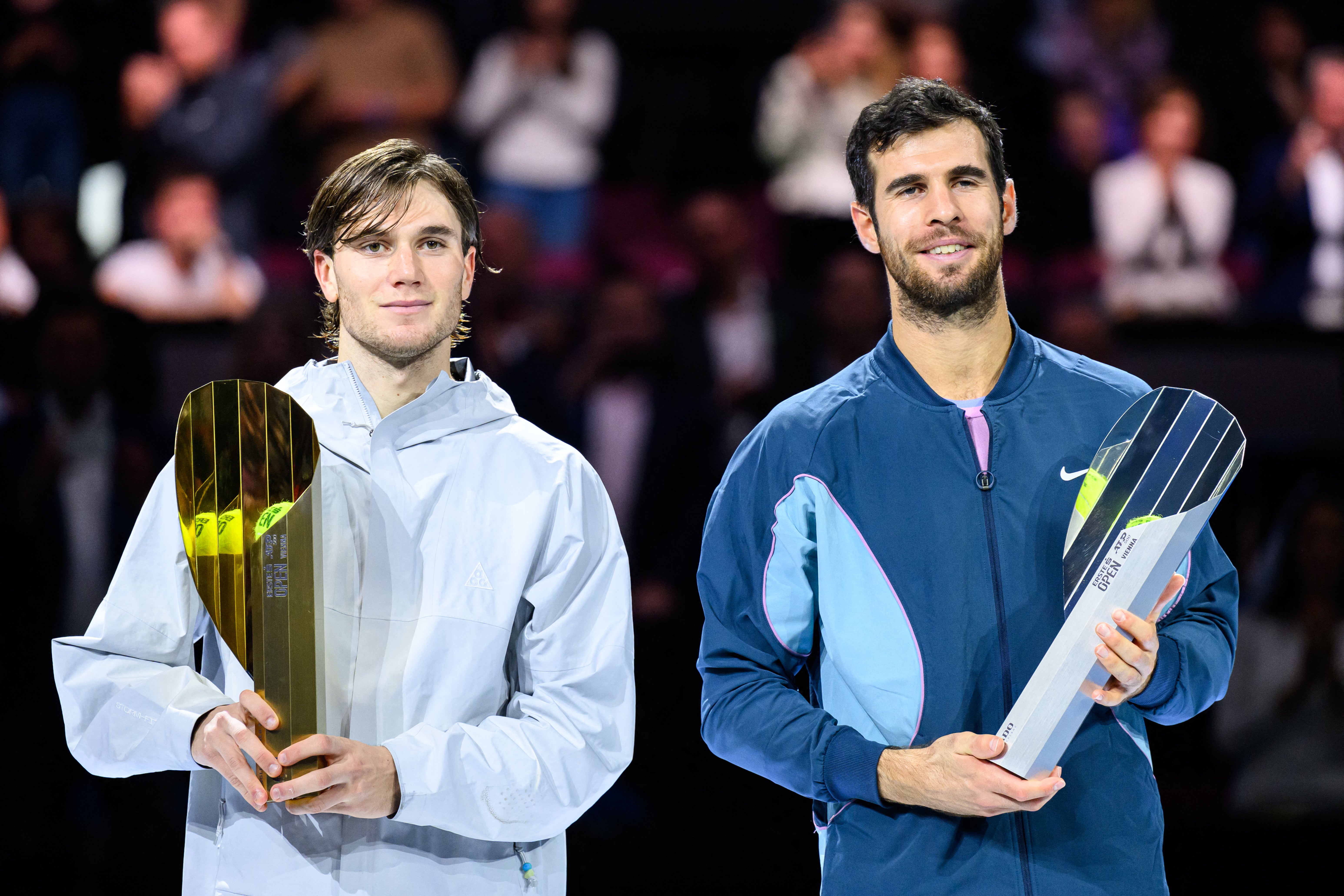 Jack Draper lifts the trophy after beating Karen Khachanov in Vienna