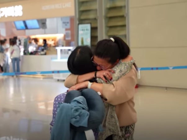 Screengrab. Darragh Hannan and Jee Won Ha, adopted at birth into different countries, met after 39 years at the Incheon airport in South Korea