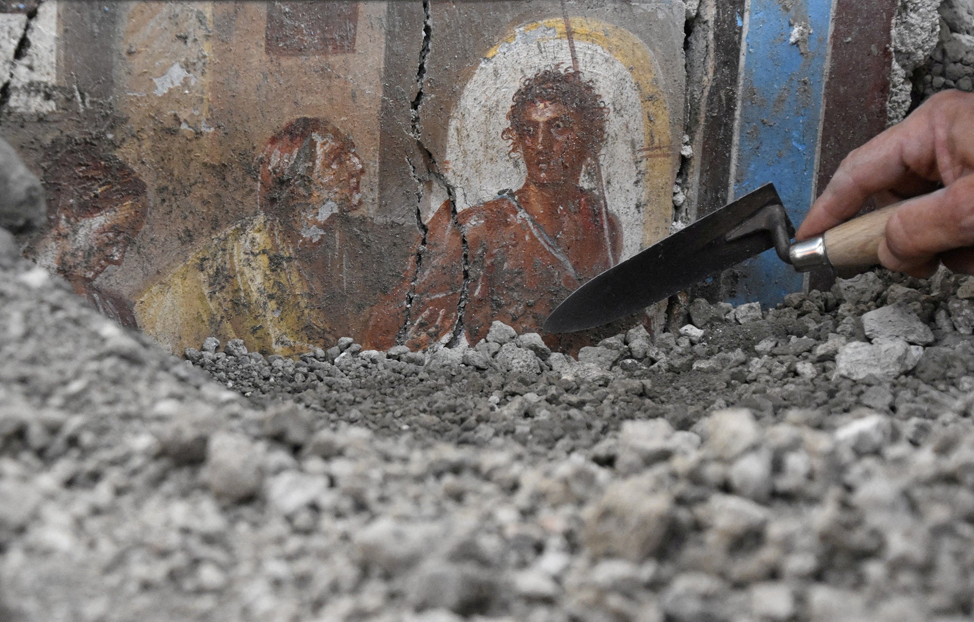 A scene depicting the Greek myth of Hippolytus and Phaedra is shown at the dig site in Pompeii, Italy. The dwelling is notable for its high level of wall decorations. It was later submerged in ash when Mount Vesuvius exploded in 79 A.D.