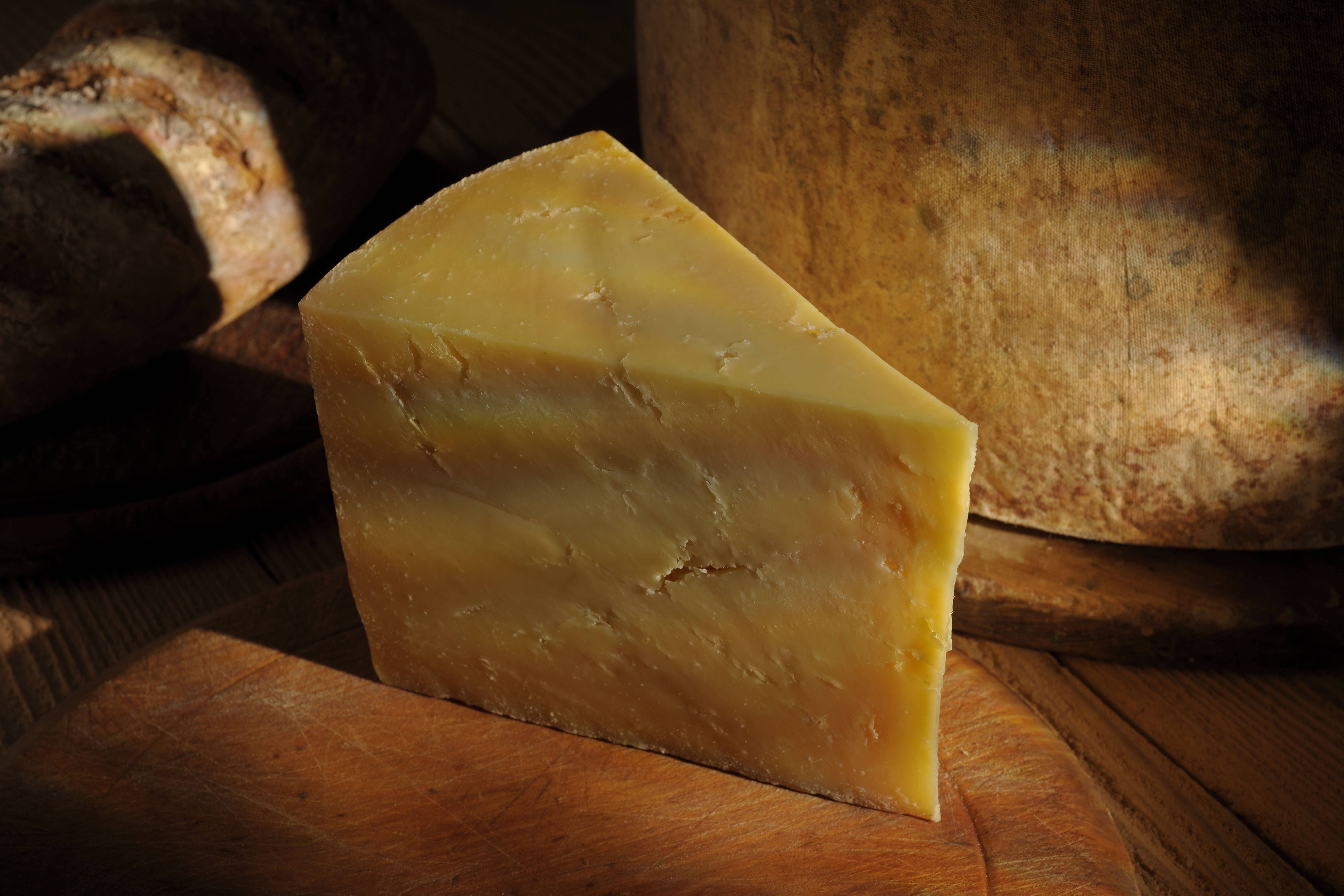 Wedge of mature cheddar cheese (Alamy/PA)