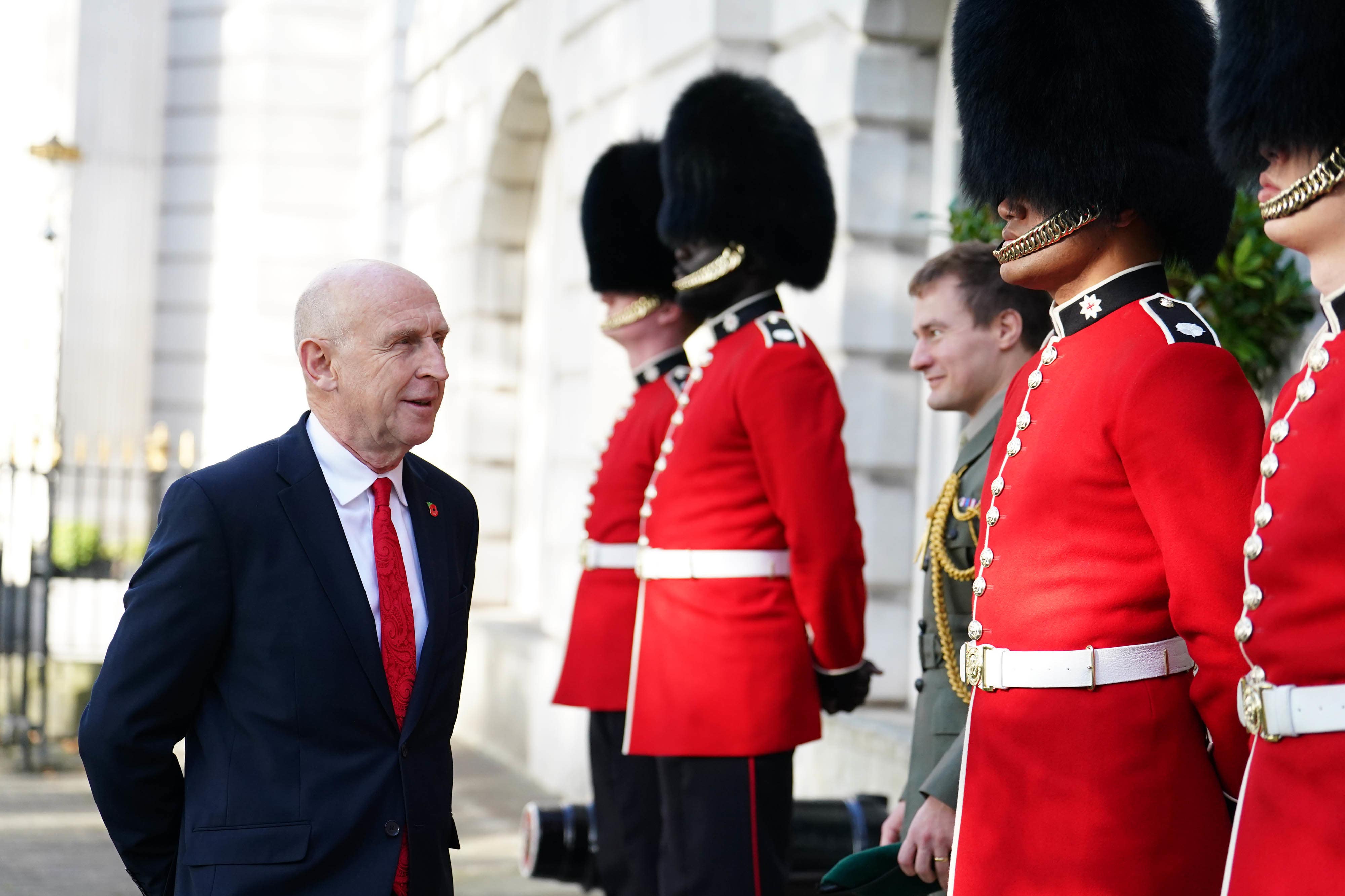 Defence Secretary John Healey (left) with the Coldstream Guards (Jordan Pettitt/PA)