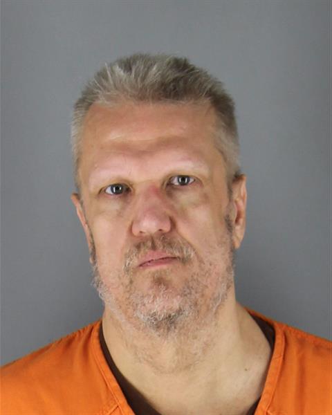 John Herbert Sawchak, 54, was arrested after allegedly shooting his neighbor in the neck