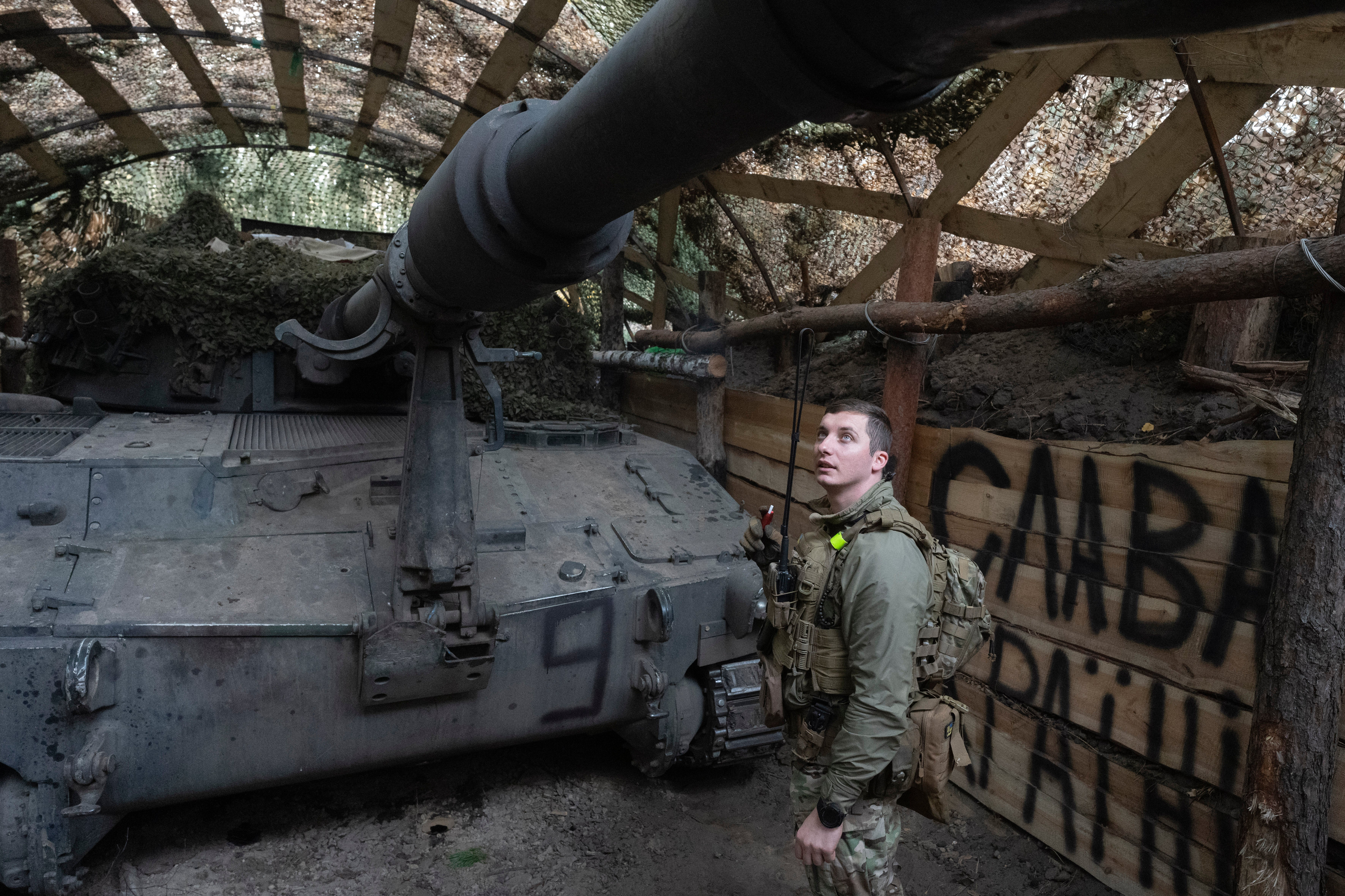 Ukrainian officer of the 92nd separate assault brigade with a 155 mm M-109 on the front line near Vovchansk 