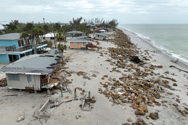<p>A drone shot shows decimated Florida beach houses after Hurricane Milton made landfall in the state earlier this month. The risk of tropical activity could extend into December, forecasters say</p>