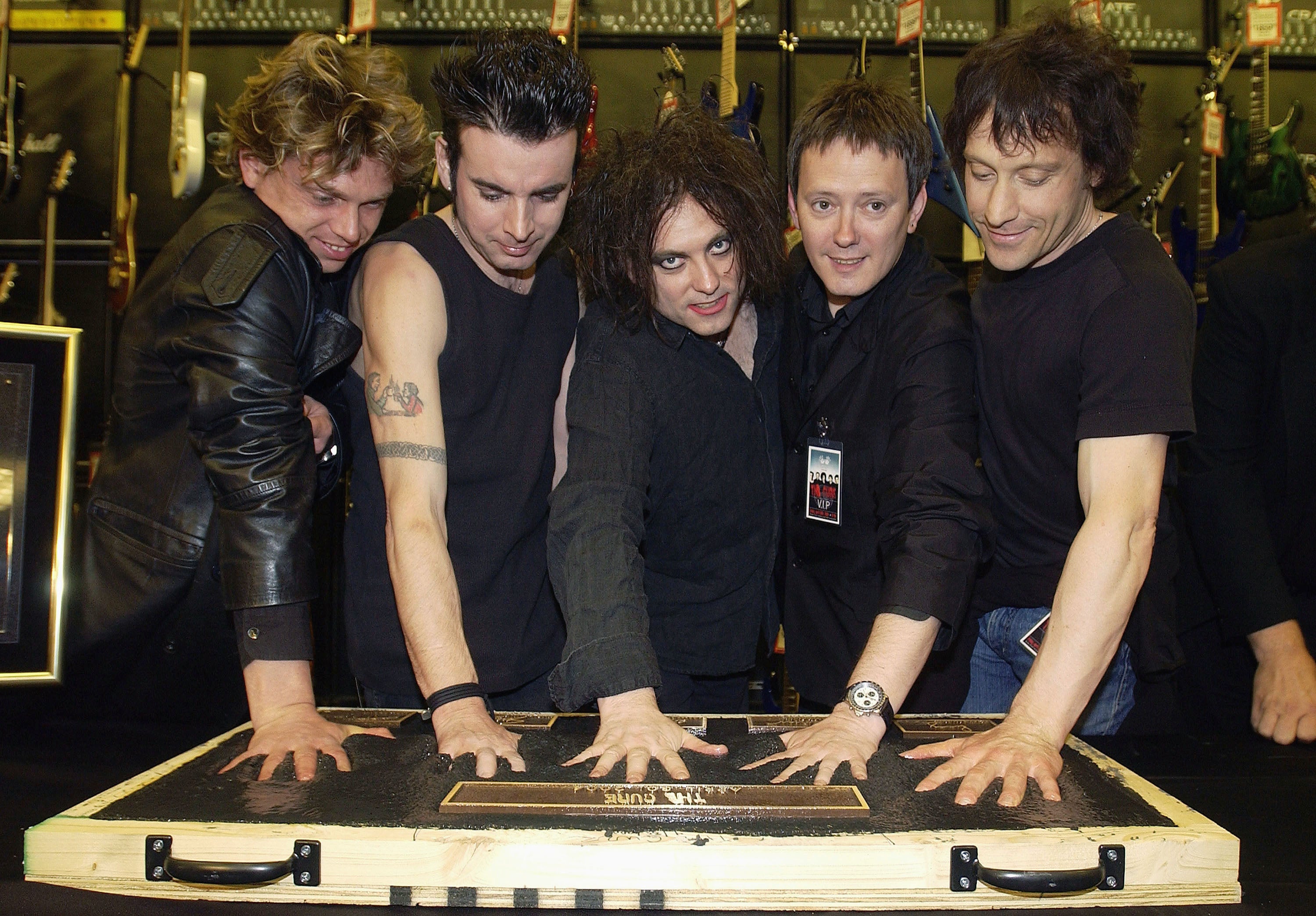 Bamonte, right, with other members of The Cure during their induction into the Rock Walk at the Guitar Center in Hollywood