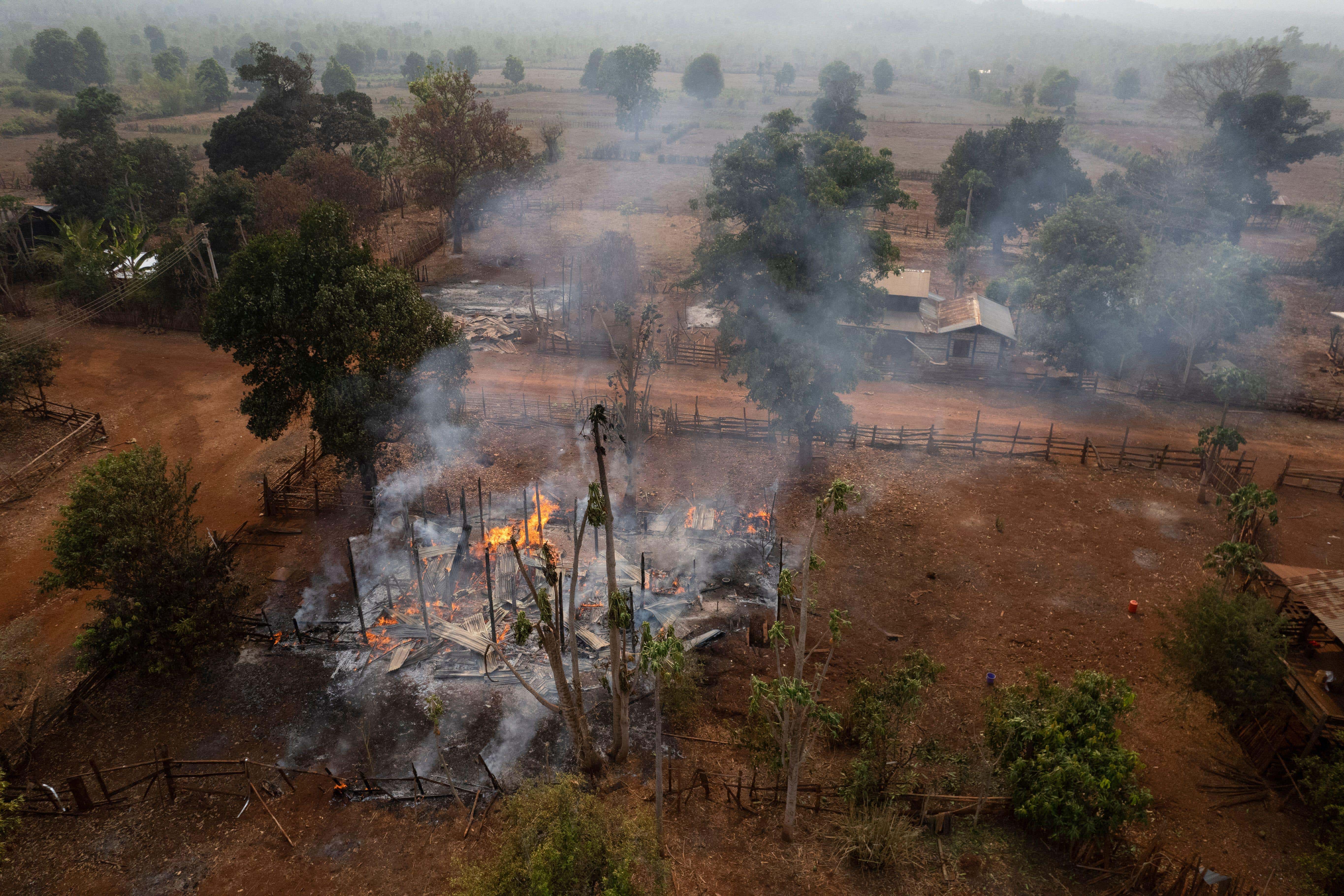 A destroyed village in Myanmar after aerial bombardment (Alamy/PA)