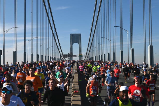 <p>Runners cross the Verrazzano-Narrows Bridge during the 2021 TCS New York City Marathon</p>