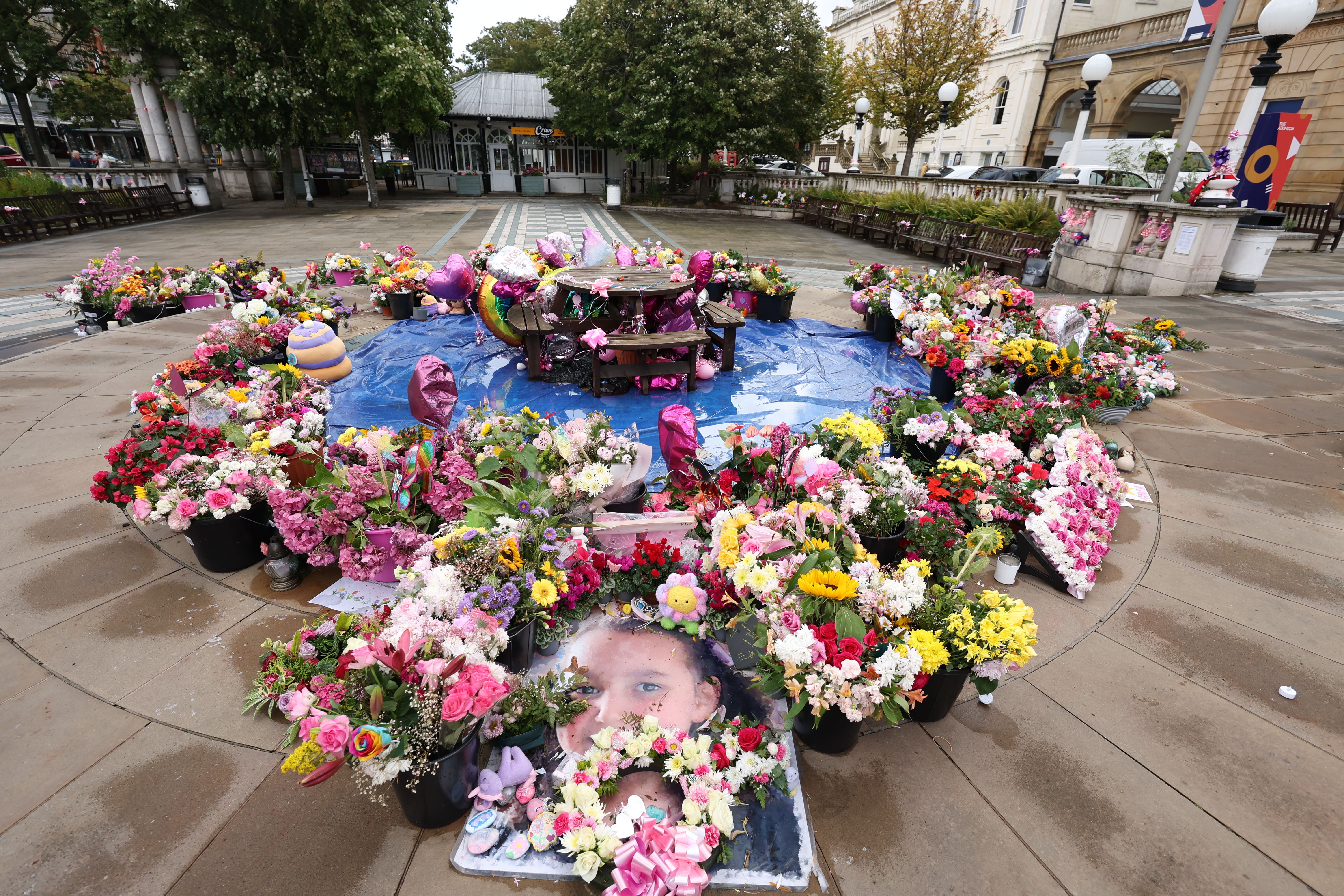 Flowers and tributes outside the Atkinson Art Centre Southport for the three girls that died in a knife attack (Paul Currie/PA)