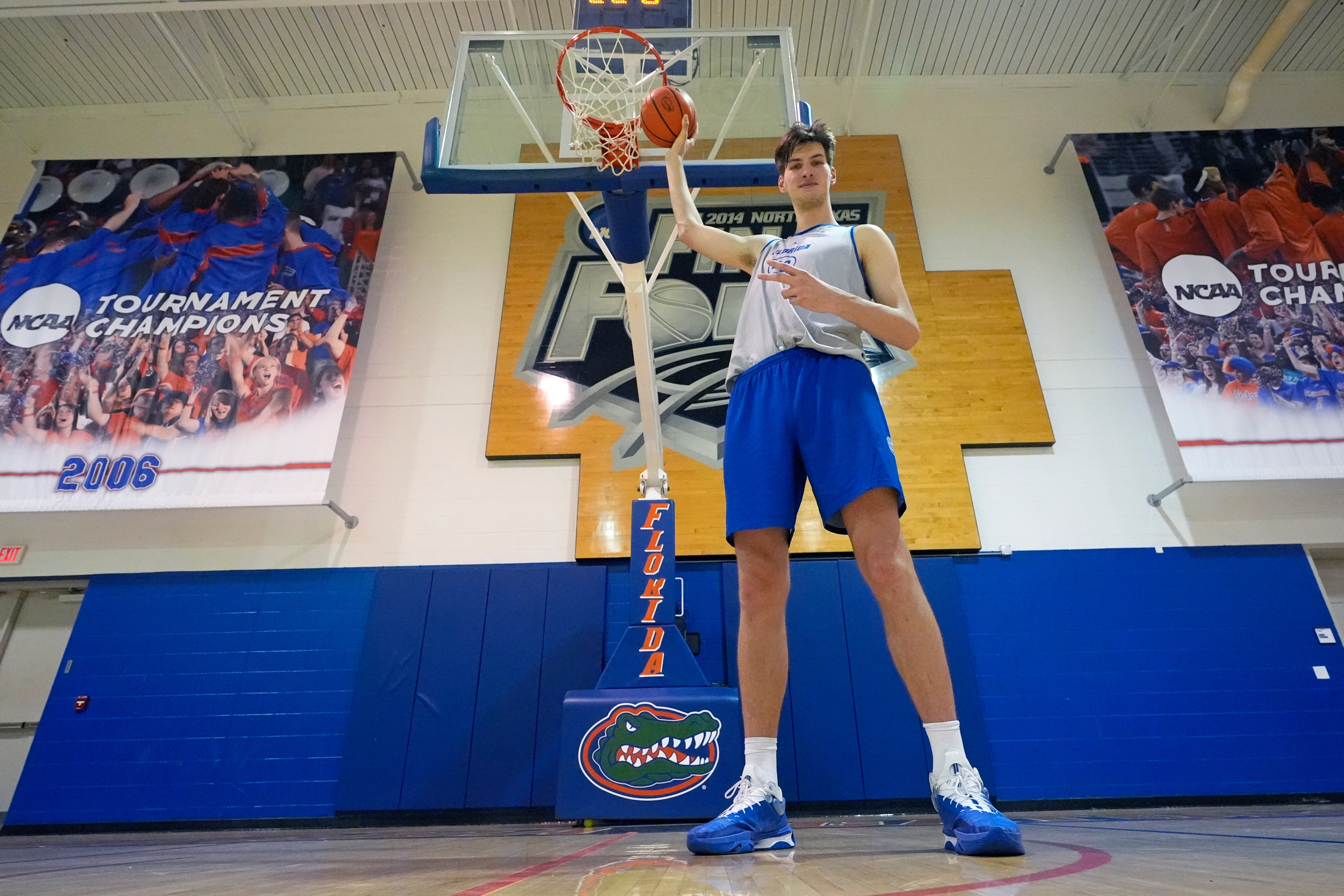 Olivier Rioux, 7-foot-9 NCAA college basketball player at Florida, poses for a photo after practice