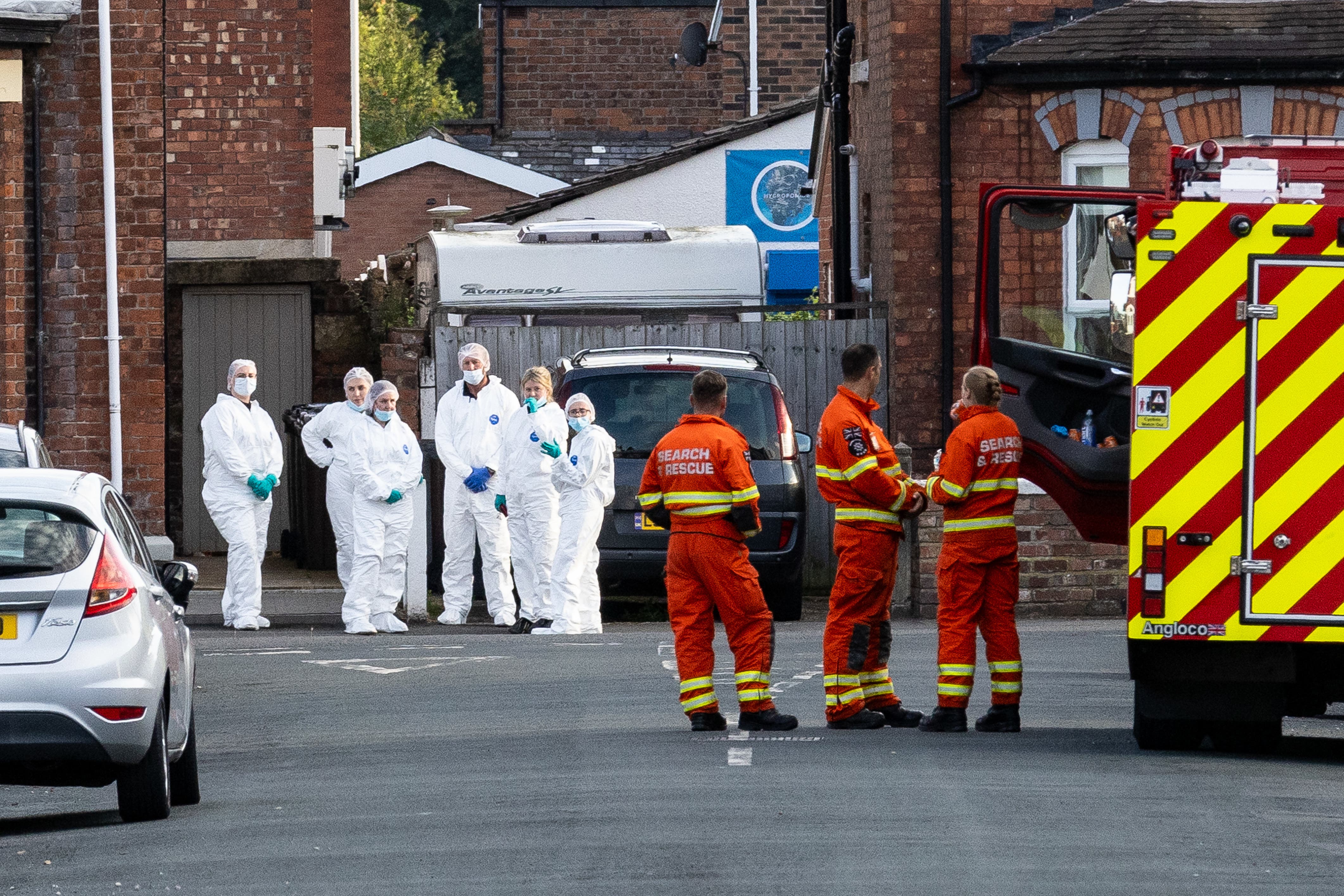 Emergency services near the scene in Hart Street, Southport, of a knife attack where three children died (James Speakman/PA)