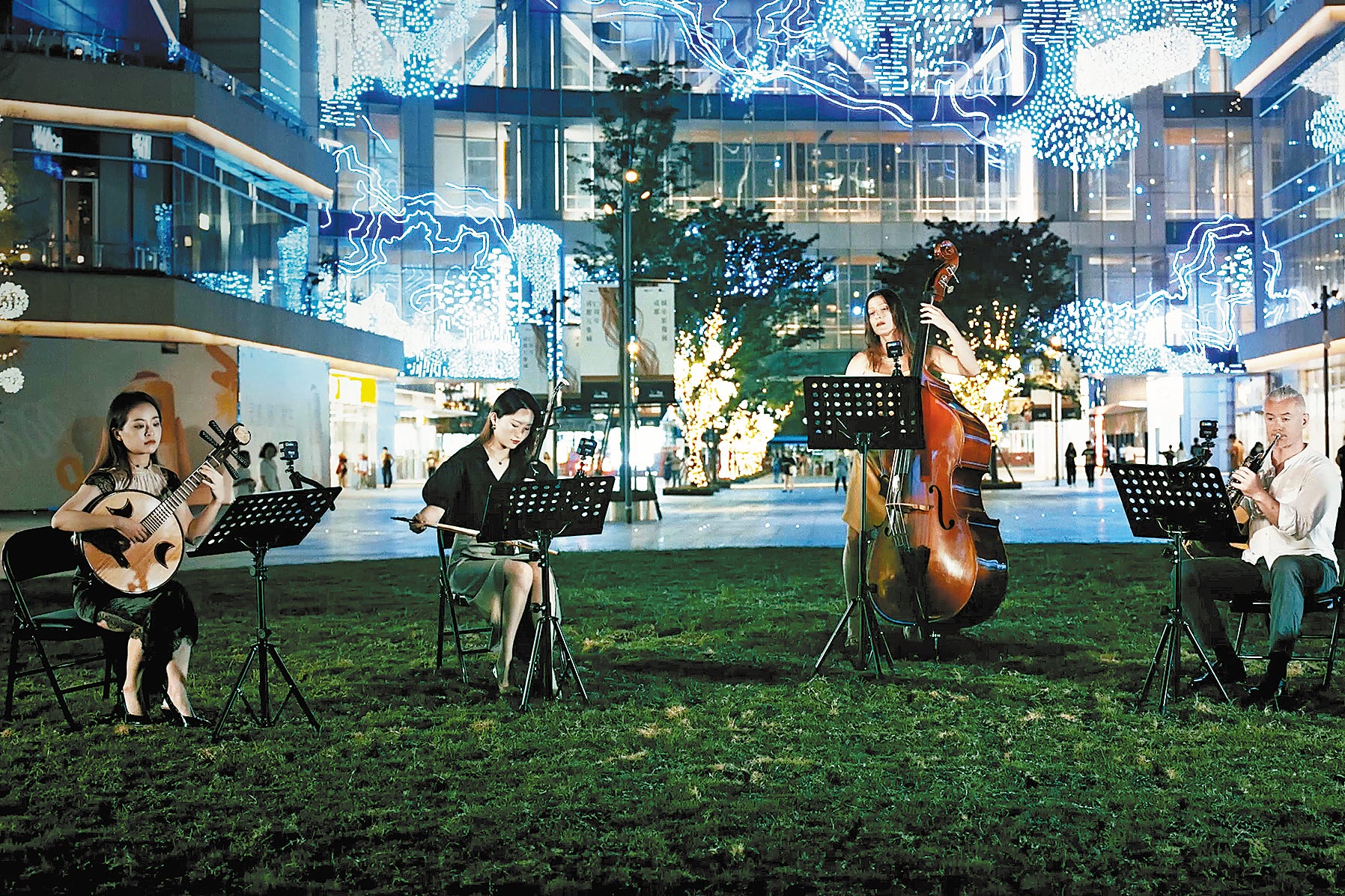 Traditional Chinese musicians and classical musicians perform together in Chengdu, Sichuan province