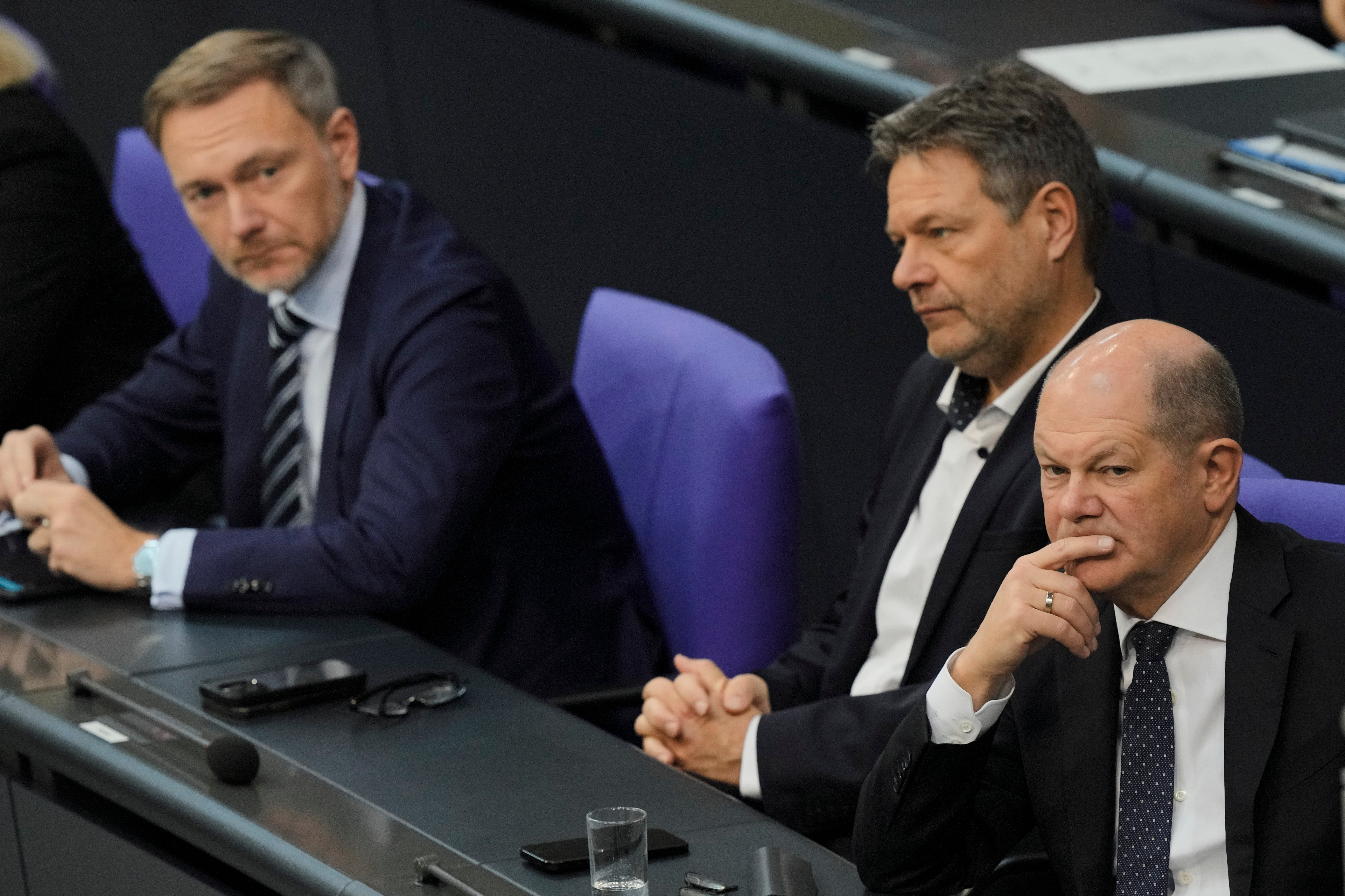 German chancellor Olaf Scholz, from right, economy and climate minister Robert Habeck and finance minister Christian Lindner