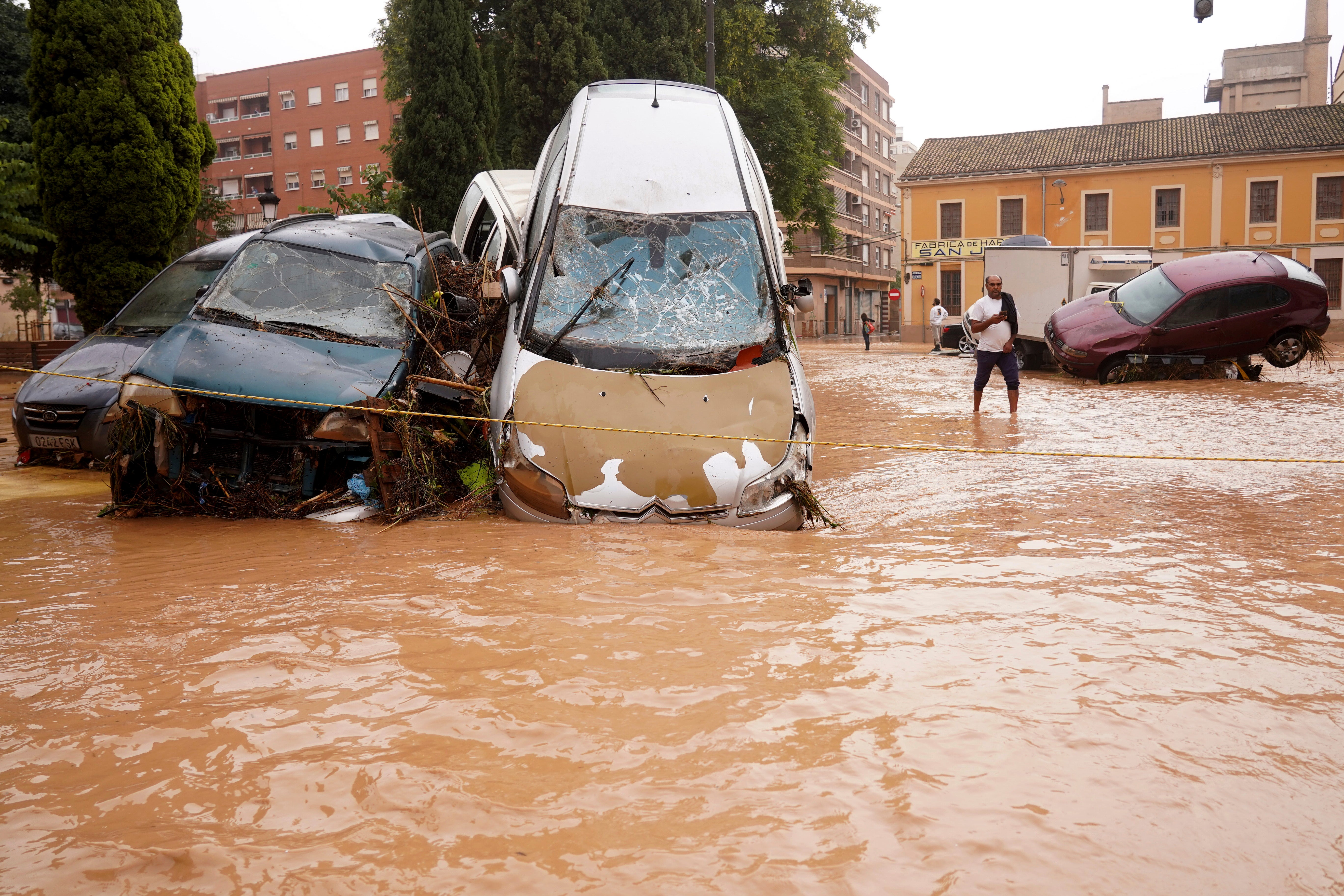 Cars piled up following torrential rain in Valencia