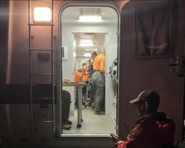 Volunteers (pictured) found the hiker after she was missing for around two days