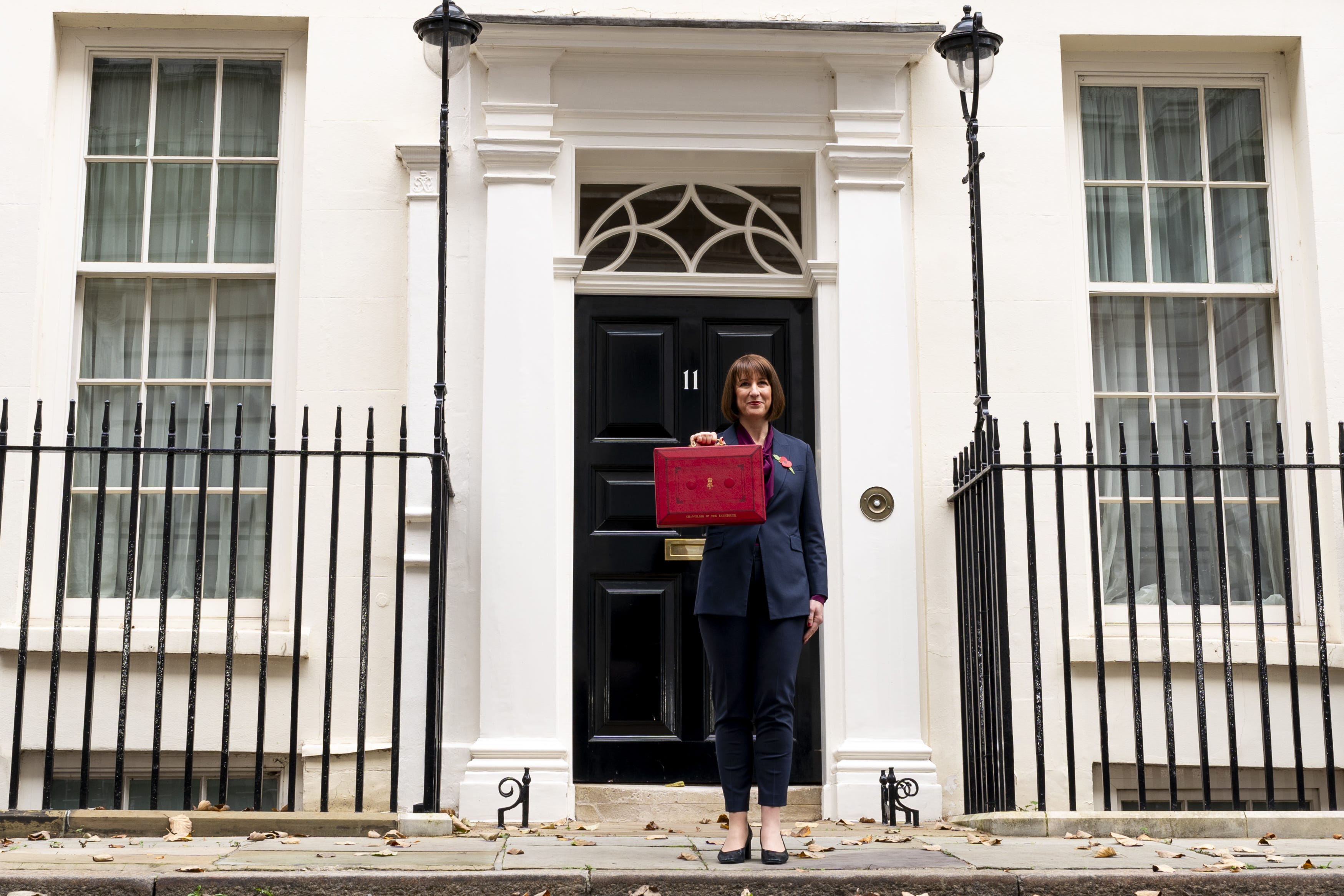 Chancellor of the Exchequer Rachel Reeves leaves 11 Downing Street, London, with her ministerial red box before delivering her first Budget (Jordan Pettitt/PA)