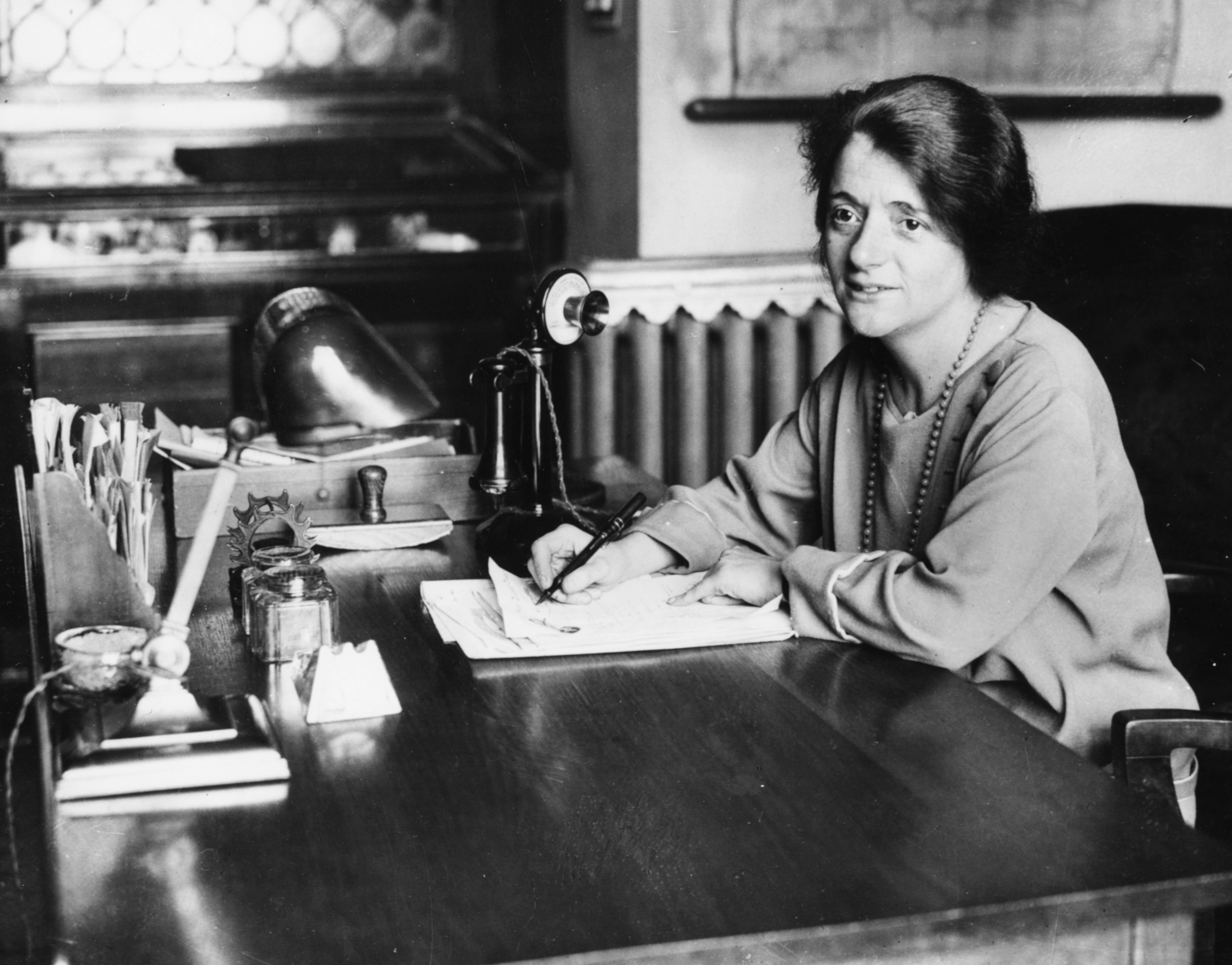 Ellen Wilkinson, the first female education secretary, pictured in her home at her desk in 1924