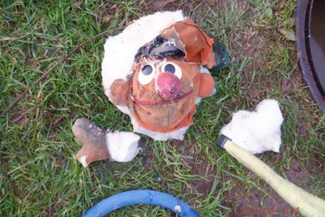 The remains of Ernie from Sesame Street were removed from the blocked sewer (Wessex Water/PA)